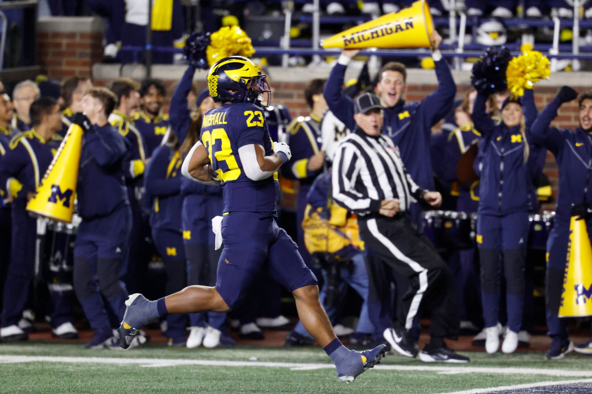 Michigan Wolverines running back Jordan Marshall (23) rushes for a touchdown in the first half against the Purdue Boilermakers at Michigan Stadium.