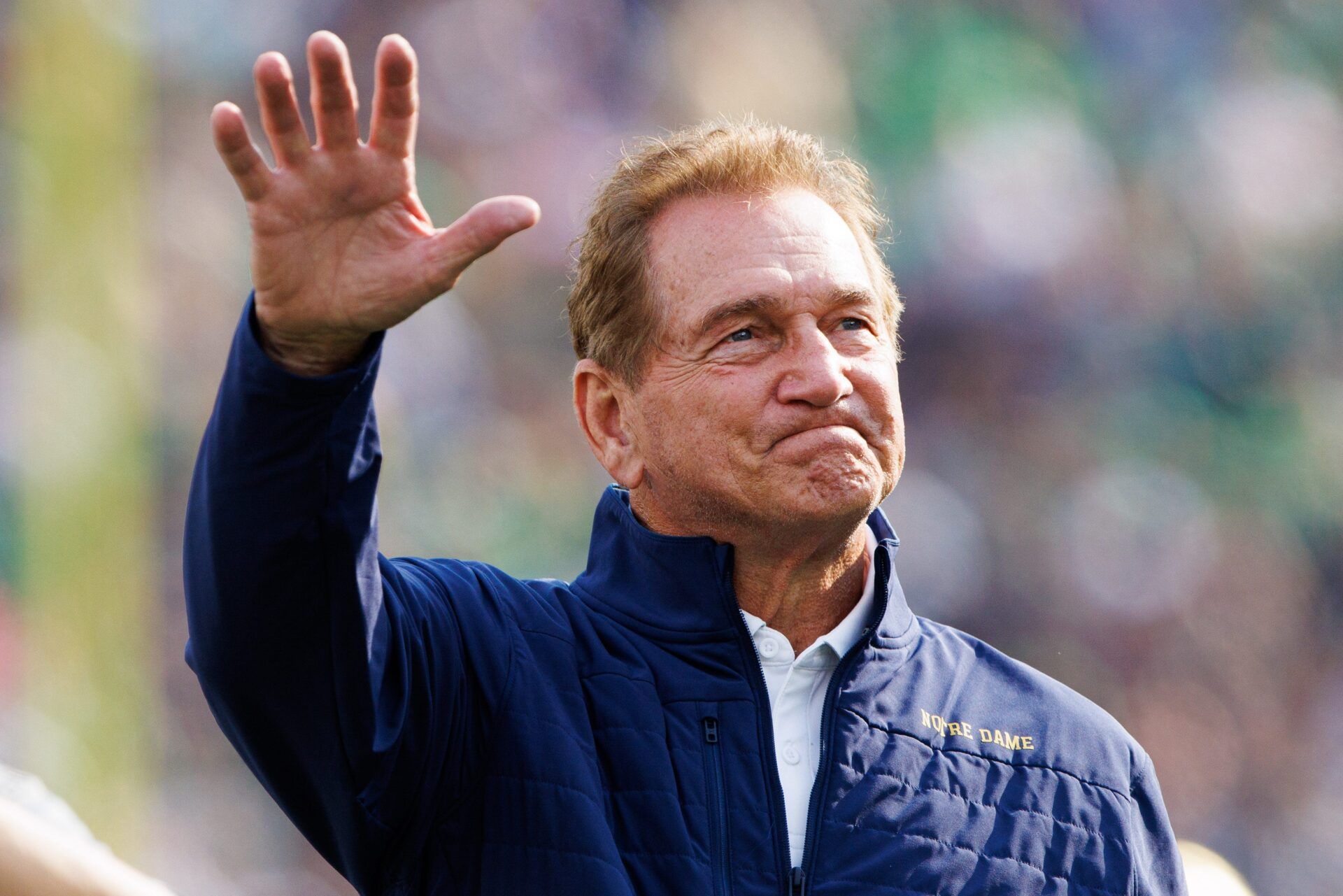 Former Notre Dame quarterback Joe Theismann waves to the crowd during a NCAA college football game between Notre Dame and Stanford at Notre Dame Stadium on Saturday, Oct. 12, 2024, in South Bend.