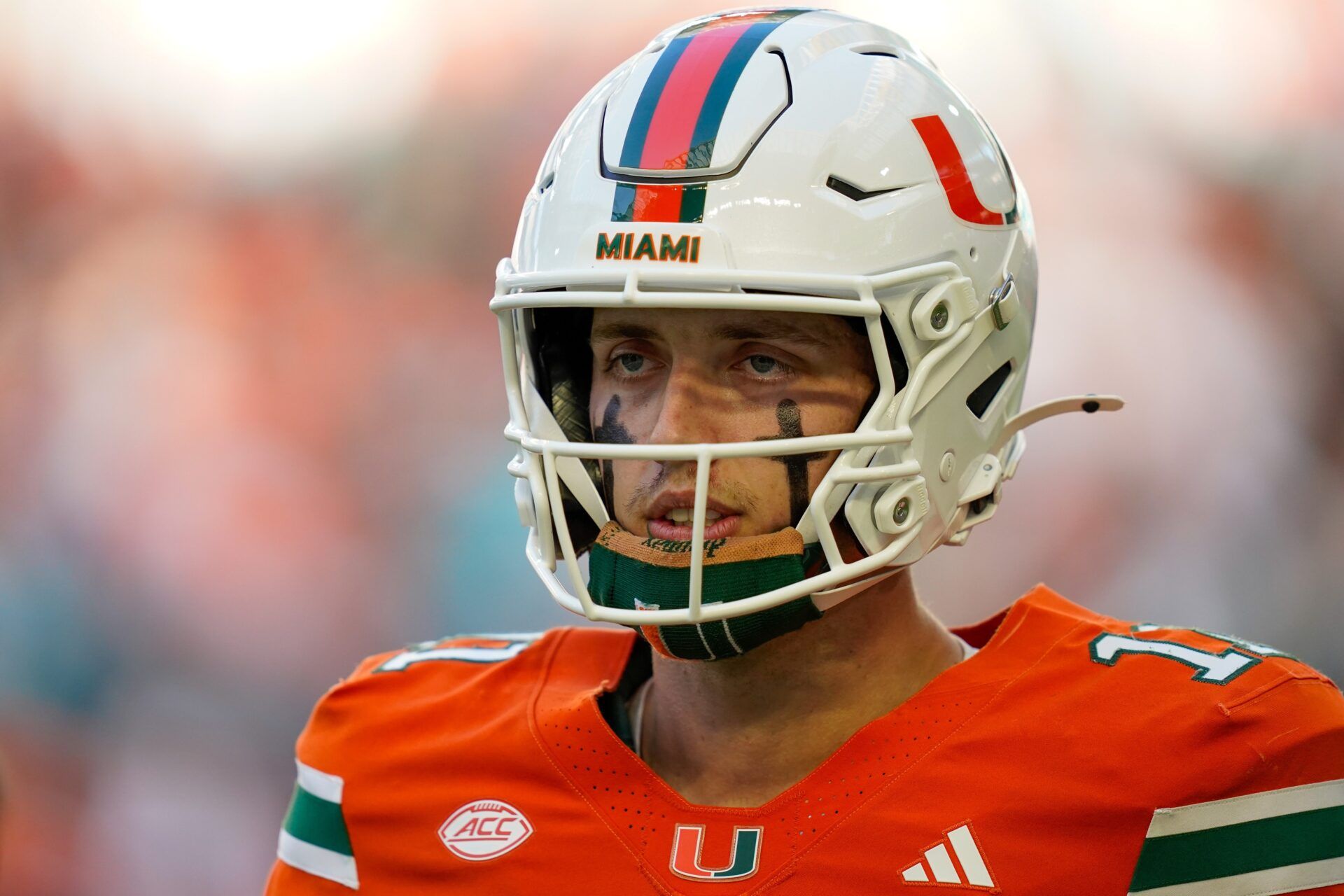 Miami Hurricanes quarterback Carson Beck (11) looks to the bench in a game against the Syracuse Orange during the first quarter at Hard Rock Stadium.