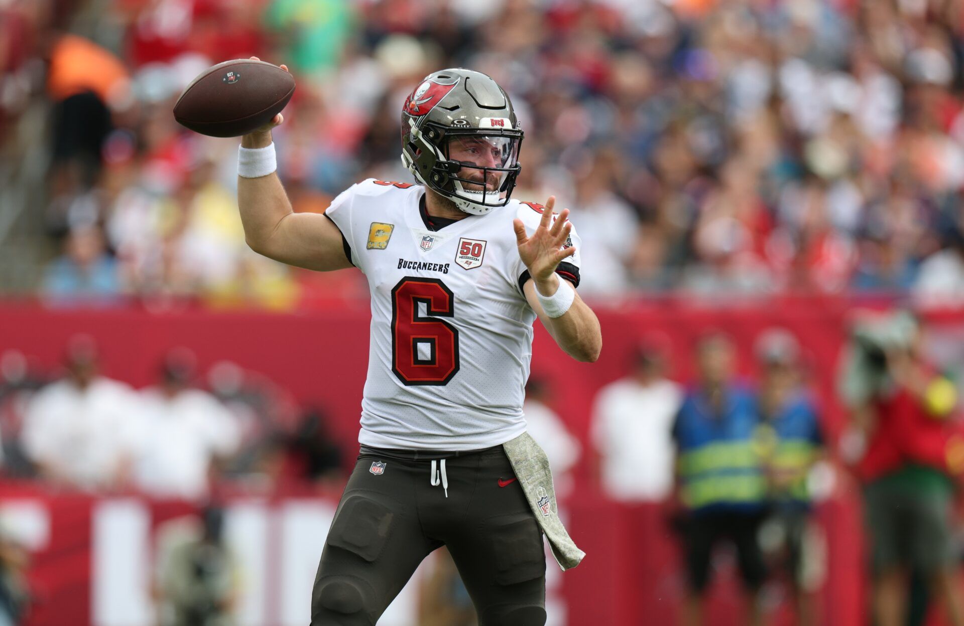 Tampa Bay Buccaneers quarterback Baker Mayfield (6) throws downfield during the second quarter against the New England Patriots at Raymond James Stadium.
