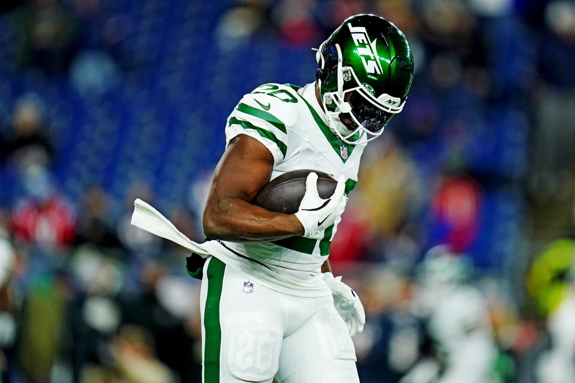 New York Jets running back Breece Hall (20) warms up before the game against the New England Patriots at Gillette Stadium.