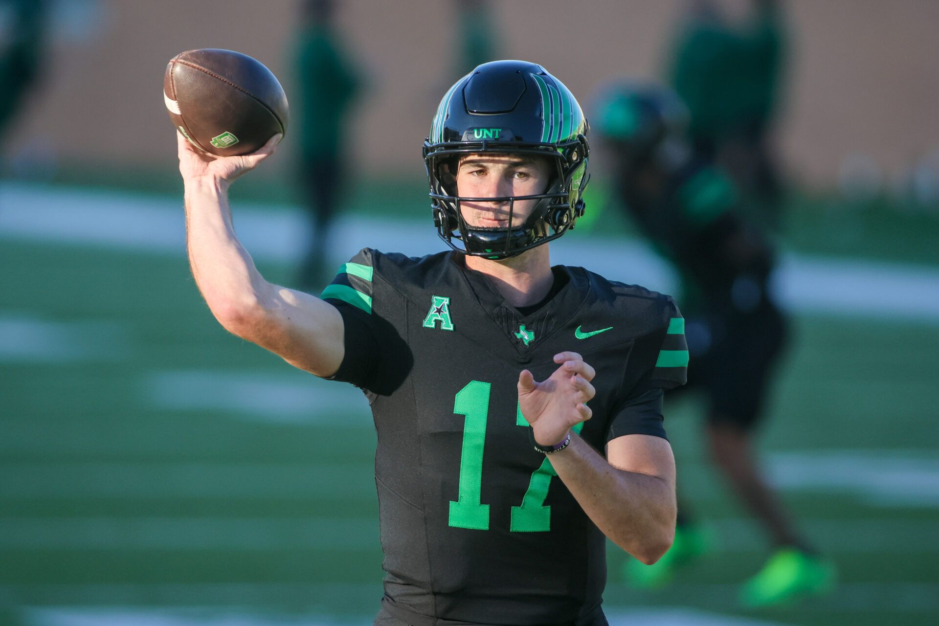 North Texas Mean Green quarterback Drew Mestemaker (17) warms up prior to a game against the South Florida Bulls at DATCU Stadium.