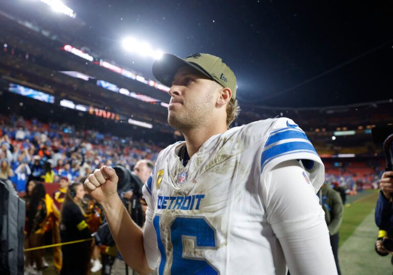 Detroit Lions quarterback Jared Goff (16) walks off the field following a game against the Washington Commanders at Northwest Stadium.