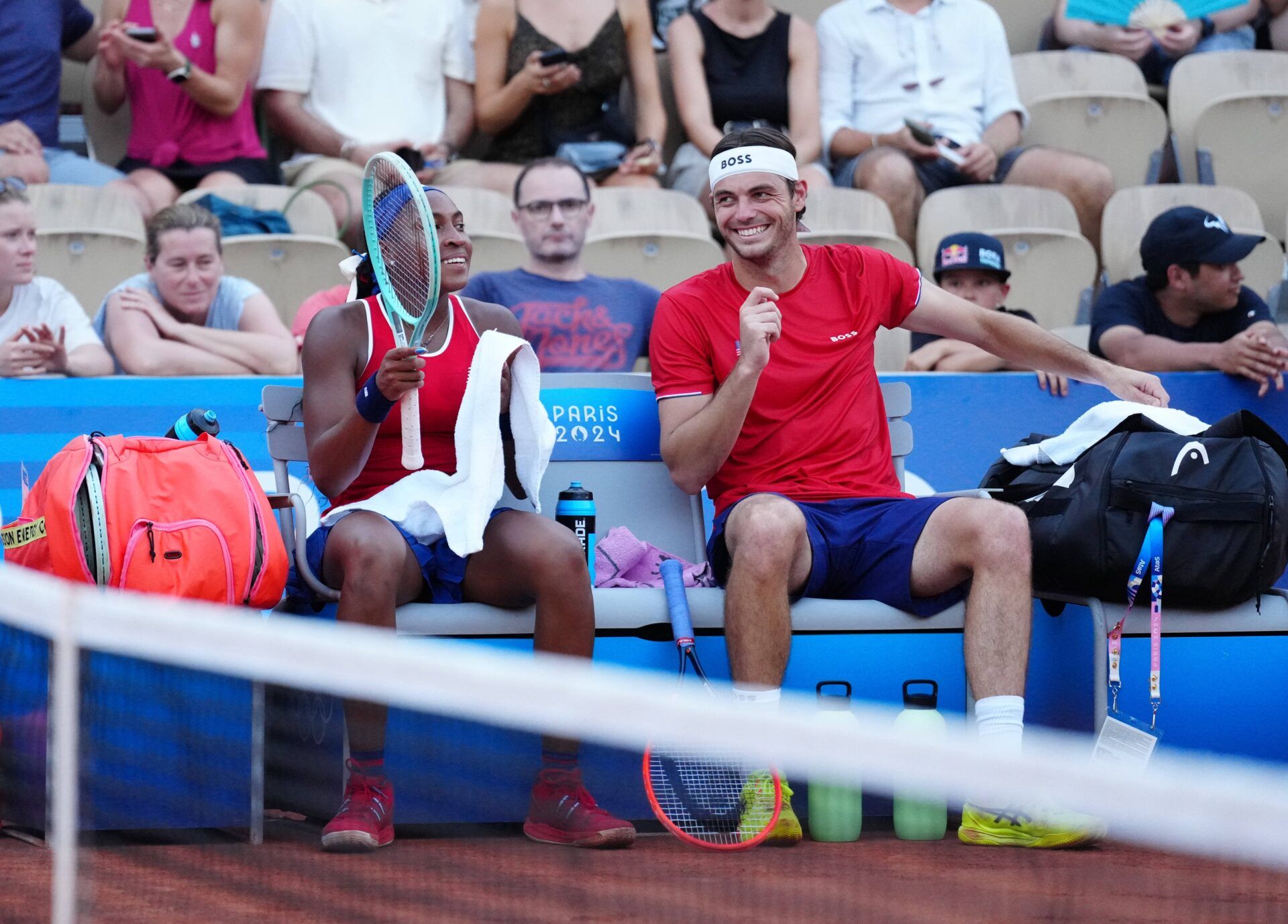 Coco Gauff (USA) and Taylor Fritz (USA) react during a mixed doubles tennis match during the Paris 2024 Olympic Summer Games at Stade Roland Garros.