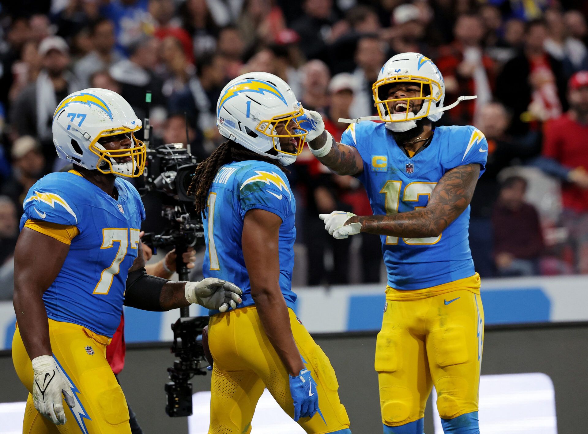 [US, Mexico & Canada customers only] Sep 5, 2025; Sao Paulo, BRAZIL;  Los Angeles Chargers wide receiver Quentin Johnston (1) celebrates with wide receiver Keenan Allen (13) after scoring a touchdown against the Kansas City Chiefs in the second half during a NFL game at Corinthians Arena.