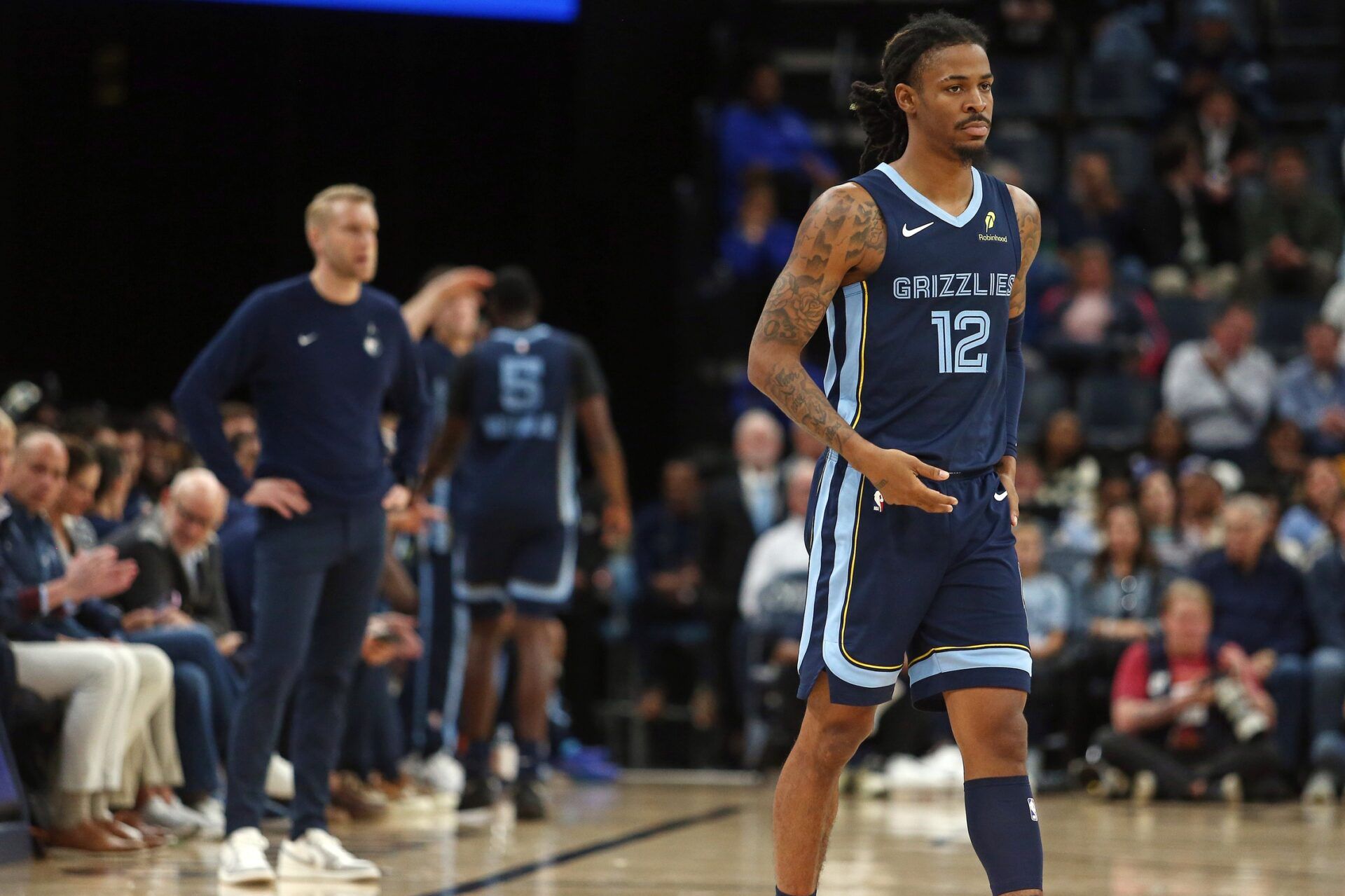 Memphis Grizzlies guard Ja Morant (12) checks into the game during the second quarter against the Detroit Pistons at FedExForum.