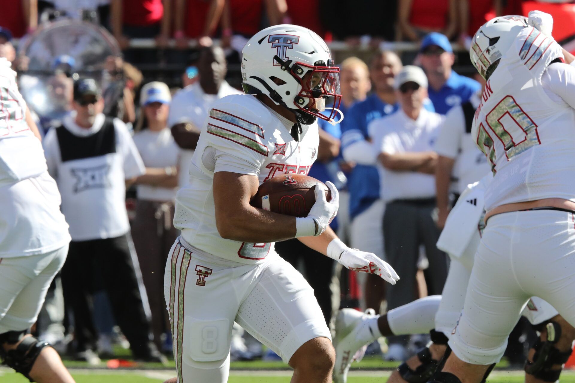 Texas Tech Red Raiders running back Cameron Dickey (8) rushes against the Brigham Young Cougars in the first half at Jones AT&T Stadium.