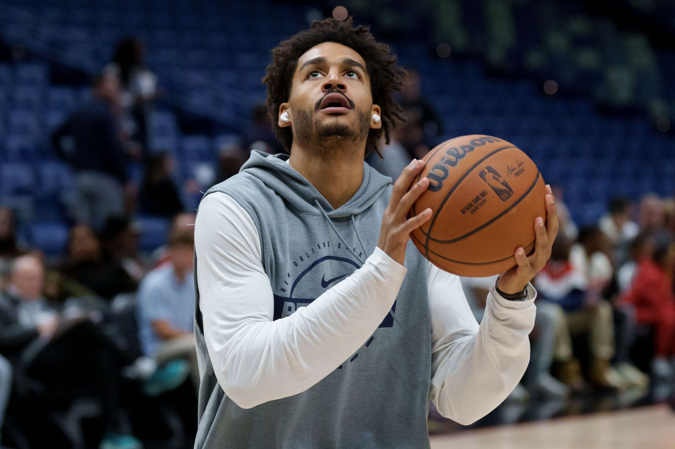 New Orleans Pelicans guard Jordan Poole warms up before a game against the Charlotte Hornets at Smoothie King Center.