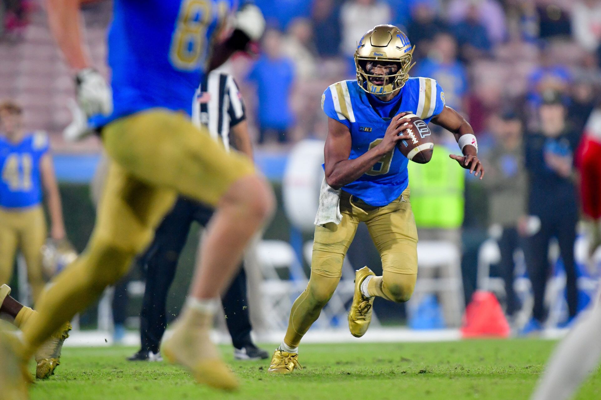 UCLA Bruins quarterback Nico Iamaleava (9) runs the ball against the Nebraska Cornhuskers during the second half at the Rose Bowl.