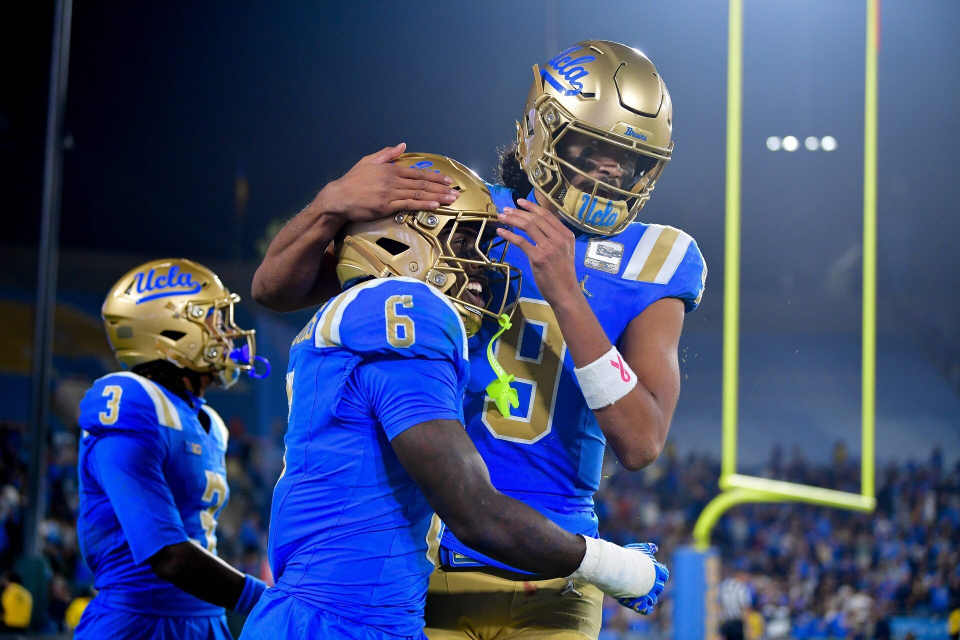 UCLA Bruins running back Anthony Woods (6) celebrates his touchdown scored against the Nebraska Cornhuskers with quarterback Nico Iamaleava (9) during the second half at the Rose Bowl.