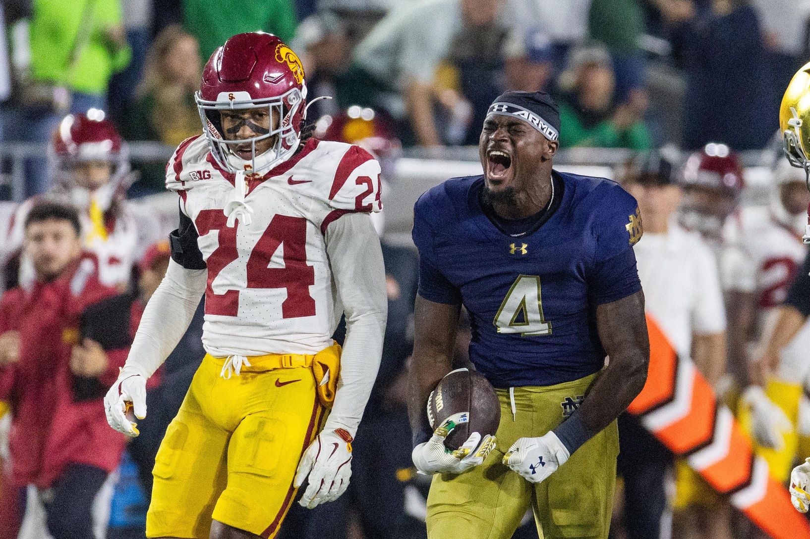 Notre Dame Fighting Irish running back Jeremiyah Love (4) celebrates a run in the first half against the Southern California Trojans at Notre Dame Stadium.