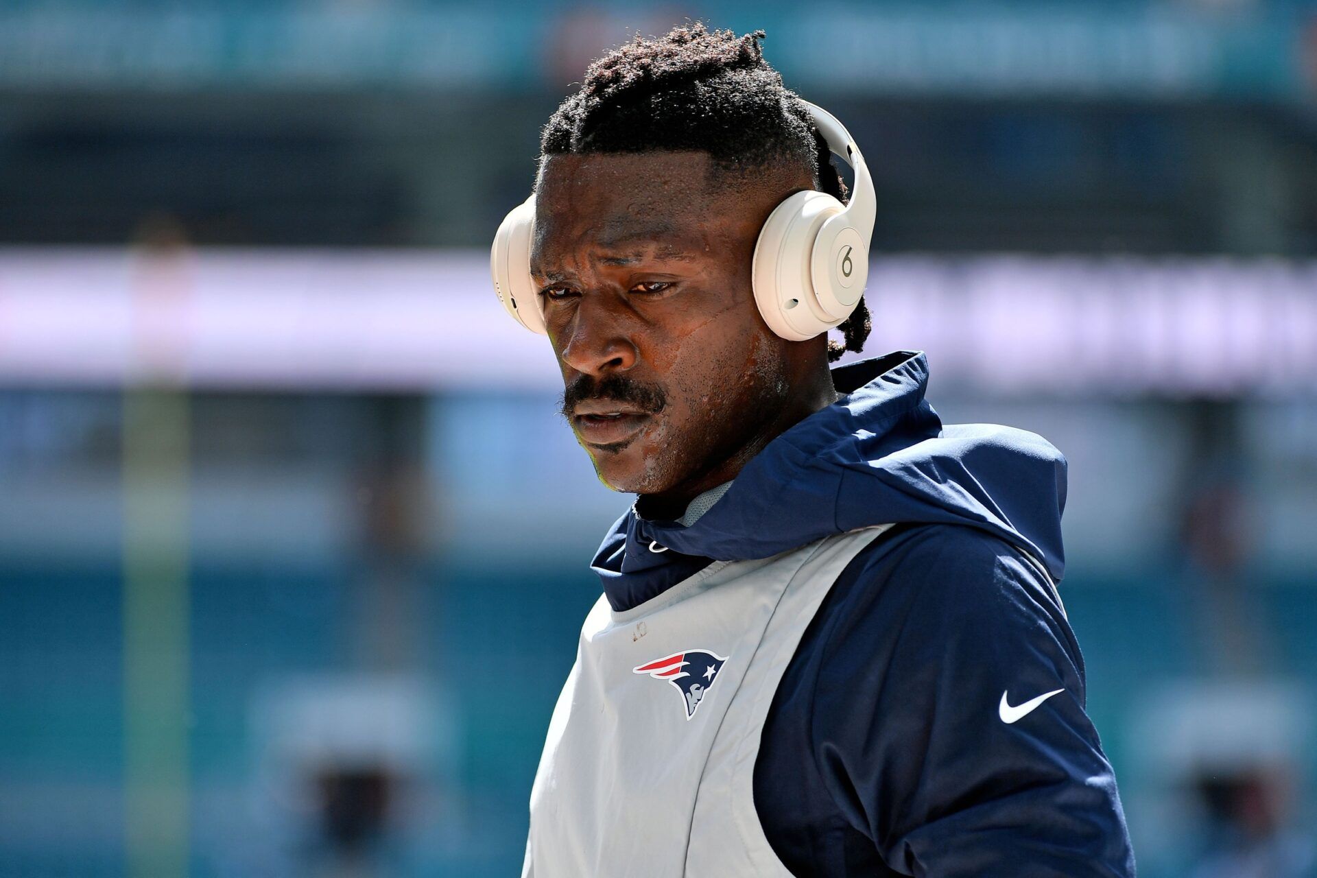 New England Patriots wide receiver Antonio Brown (17) warms up prior to the game against the Miami Dolphins at Hard Rock Stadium.