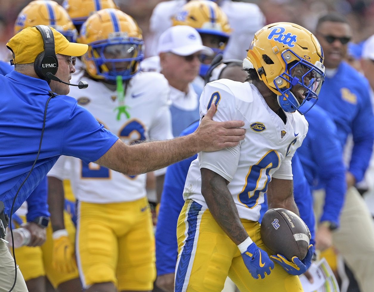 Pittsburgh Panthers running back Desmond Reid (0) is held back as he reacts to a big play in the first quarter against the Florida State Seminoles at Doak S. Campbell Stadium.