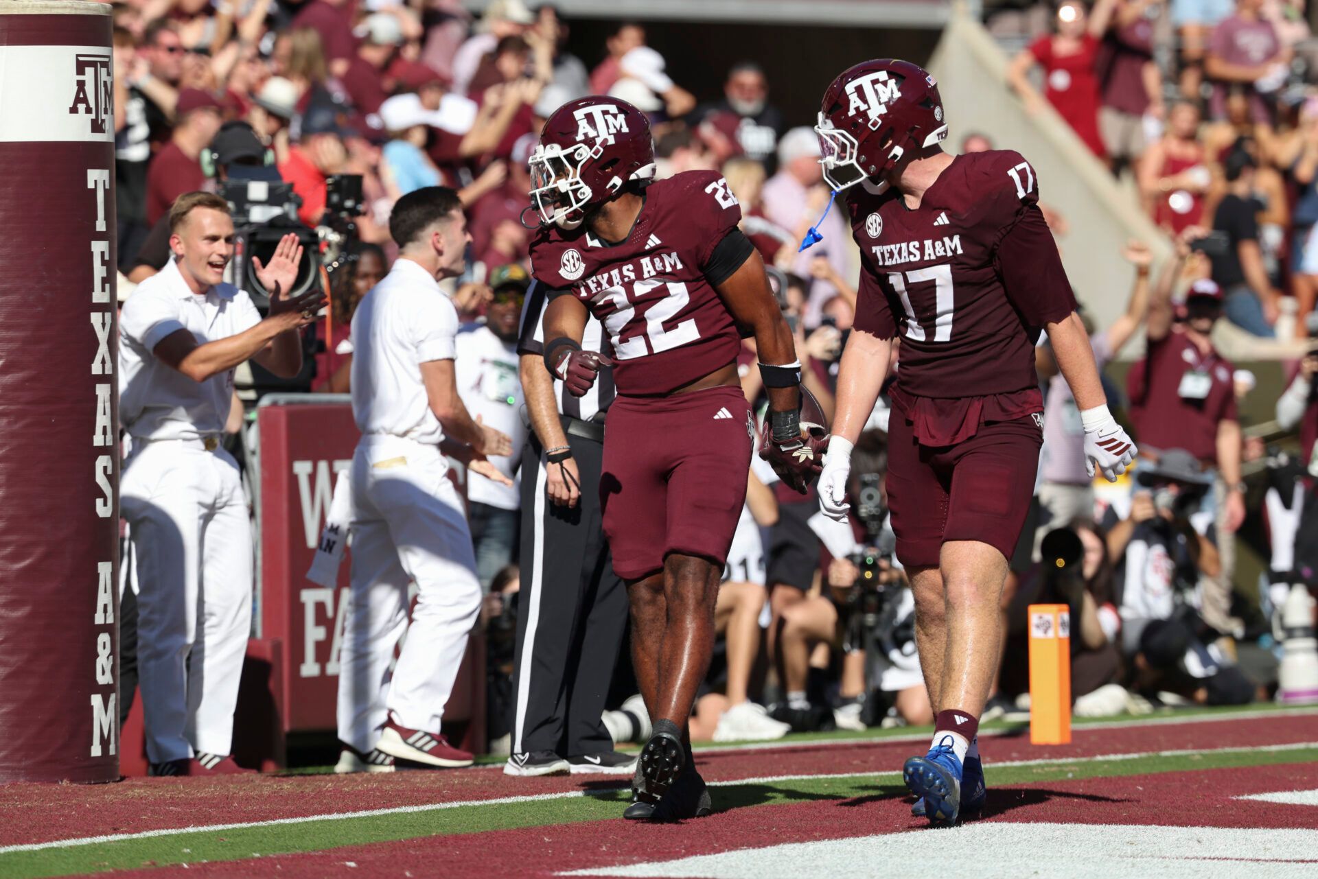 Texas A&M Aggies running back Ej Smith (22) celebrates with tight end Theo Melin Öhrström (17) after scoring a touchdown during the fourth quarter against the South Carolina Gamecocks at Kyle Field.