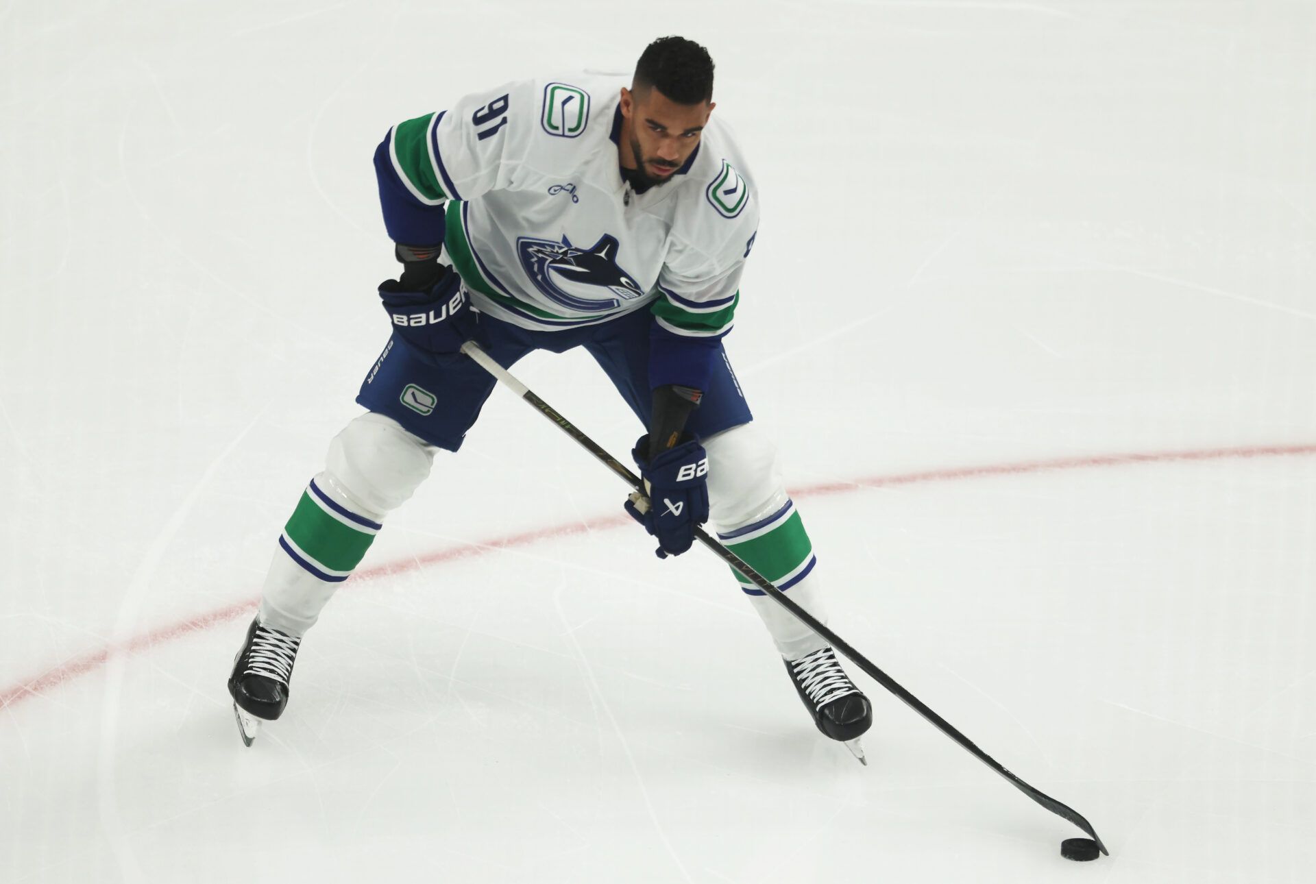 Vancouver Canucks left wing Evander Kane (91) warms up before a game against the Pittsburgh Penguins at PPG Paints Arena.