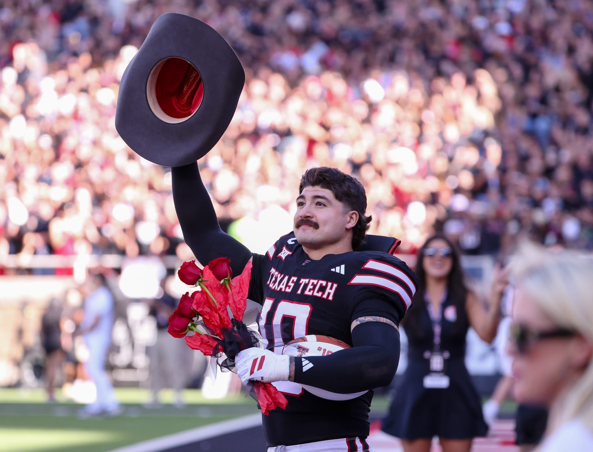 Texas Tech's Jacob Rodriguez acknowledges the crowd after being honored on senior day before a Big 12 Conference football game, Saturday, Nov. 15, 2025, at Jones AT&T Stadium.