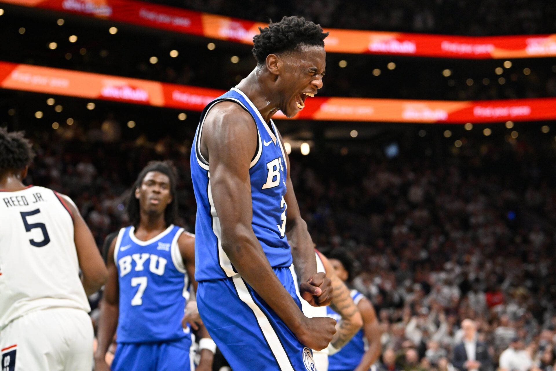 BYU Cougars forward AJ Dybantsa (3) reacts after making a basket against the UConn Huskies during the second half at TD Garden.