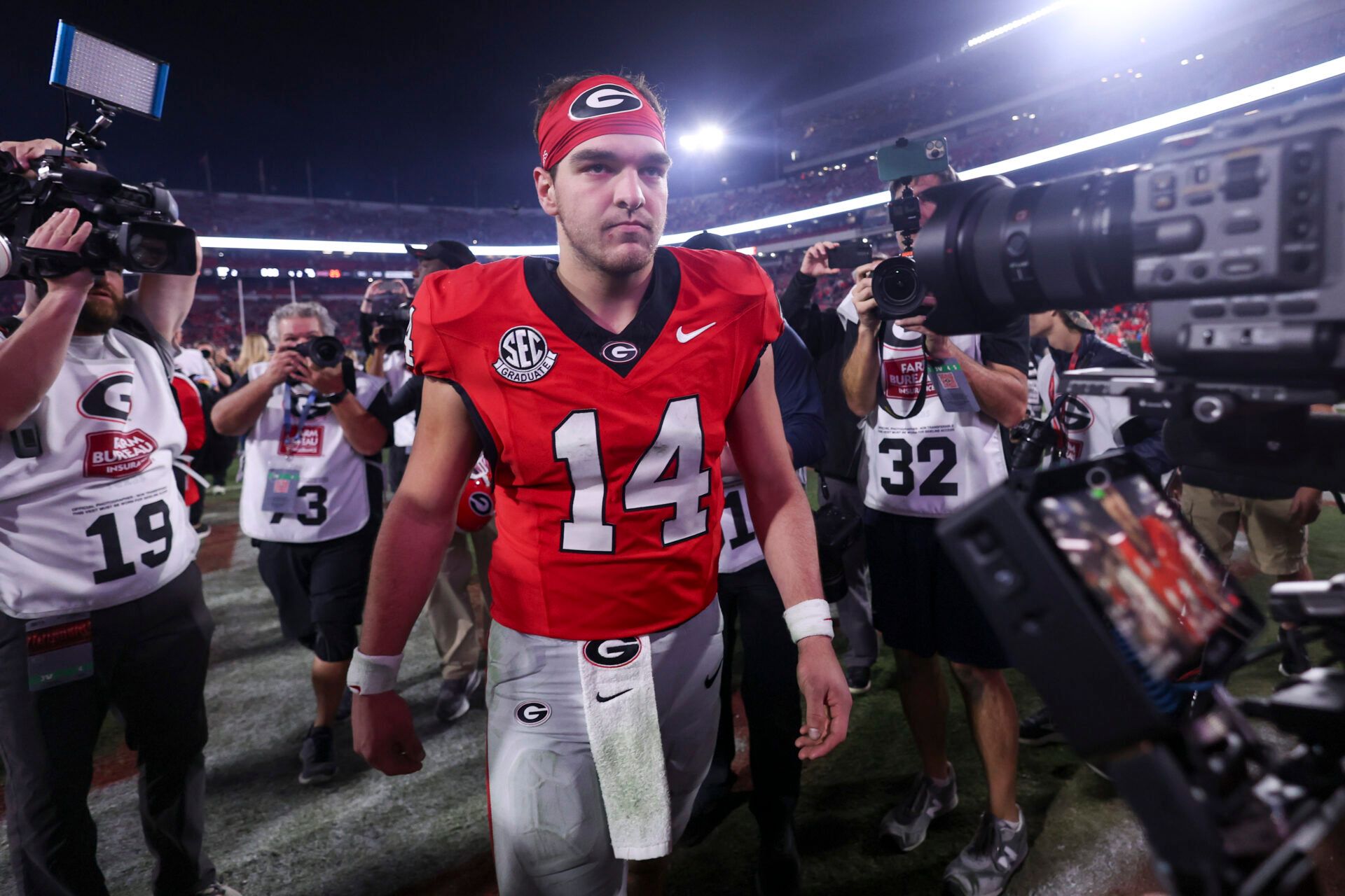 Georgia Bulldogs quarterback Gunner Stockton (14) looks on after the game against the Texas Longhorns at Sanford Stadium.