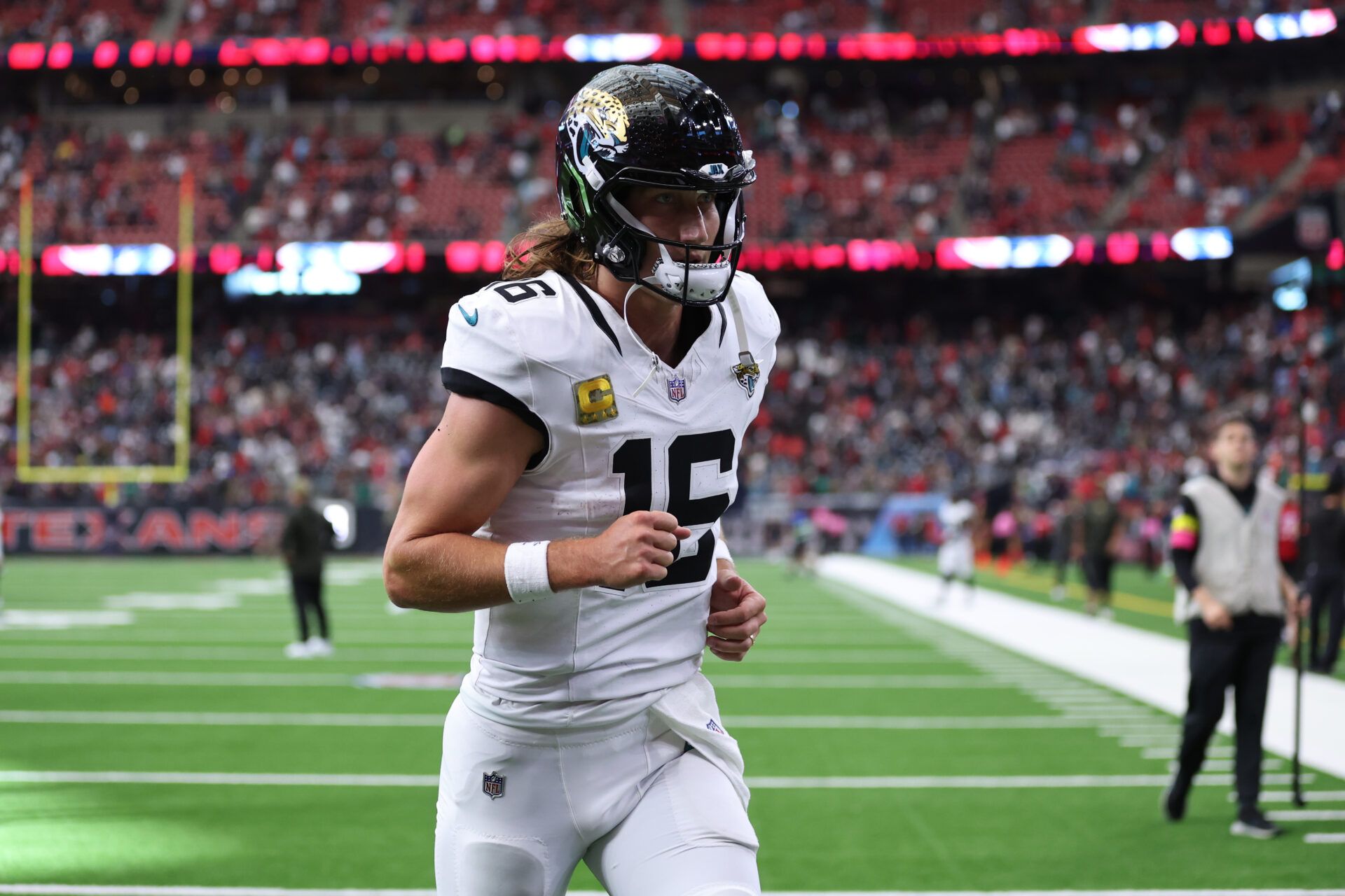 Jacksonville Jaguars quarterback Trevor Lawrence (16) leaves the field following a game against the Houston Texans at NRG Stadium.