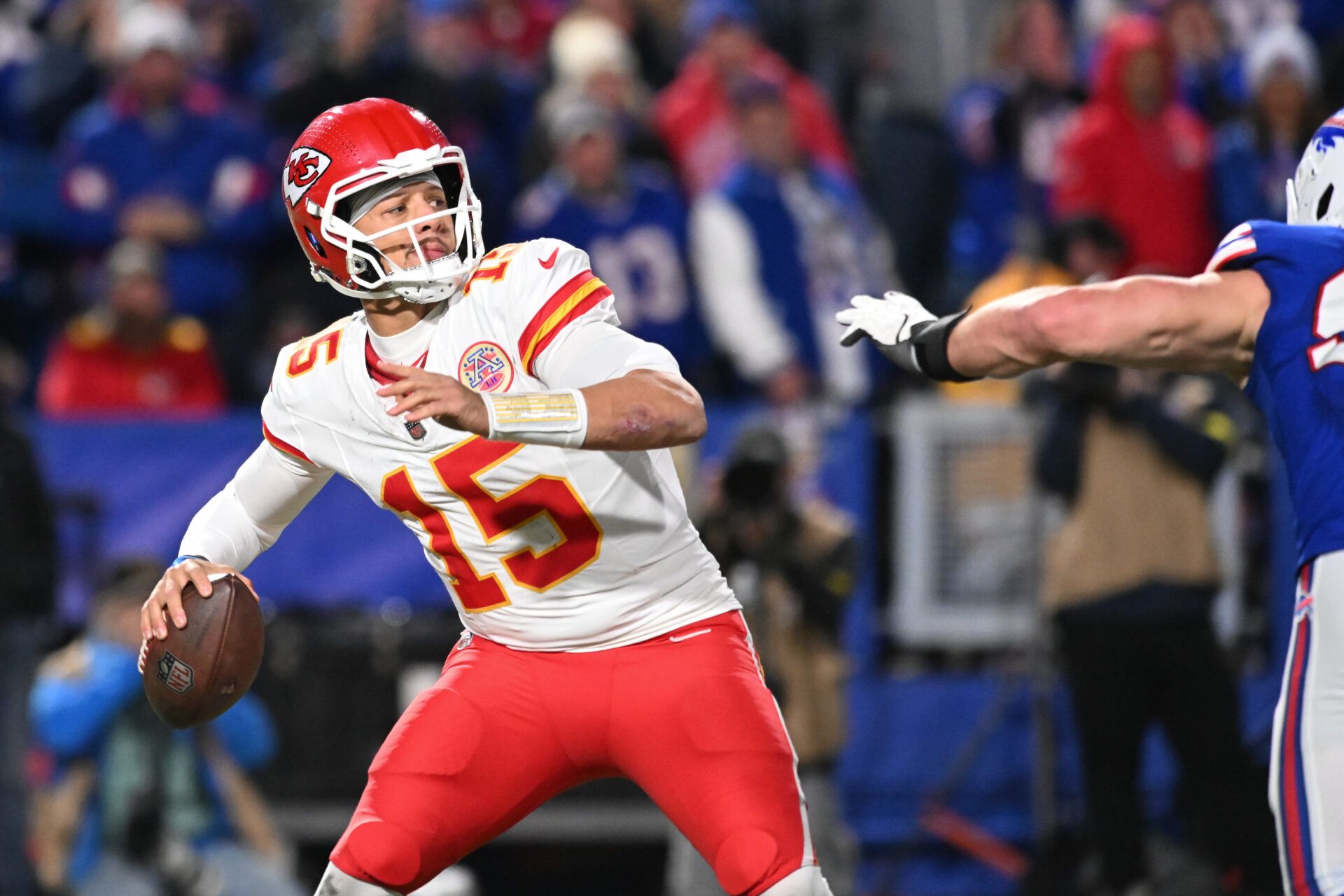 Kansas City Chiefs quarterback Patrick Mahomes (15) throws the ball in the second half against the Buffalo Bills at Highmark Stadium.