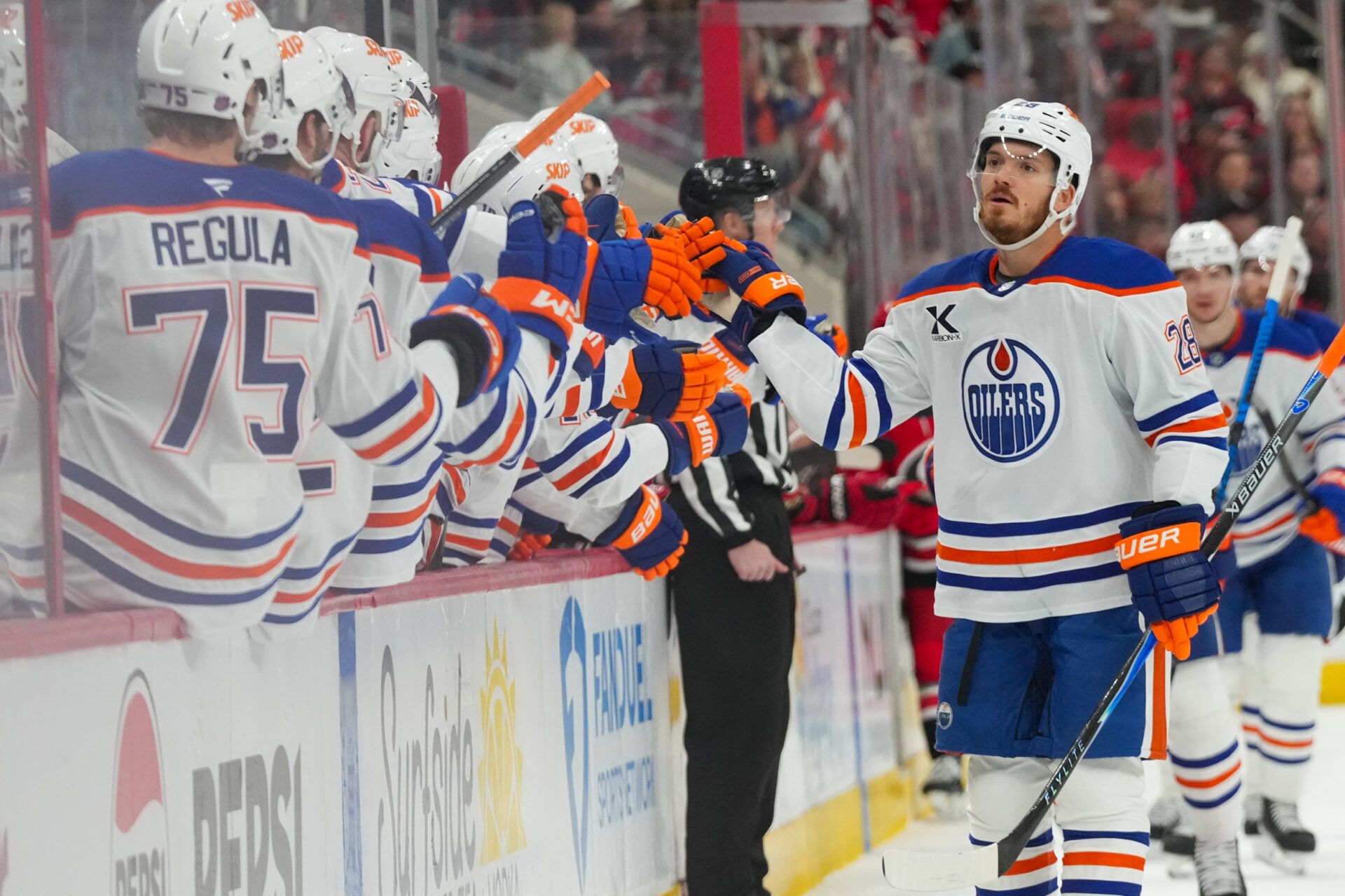 Edmonton Oilers center Jack Roslovic (28) nucleates his goal against the Carolina Hurricanes during the first period at Lenovo Center.
