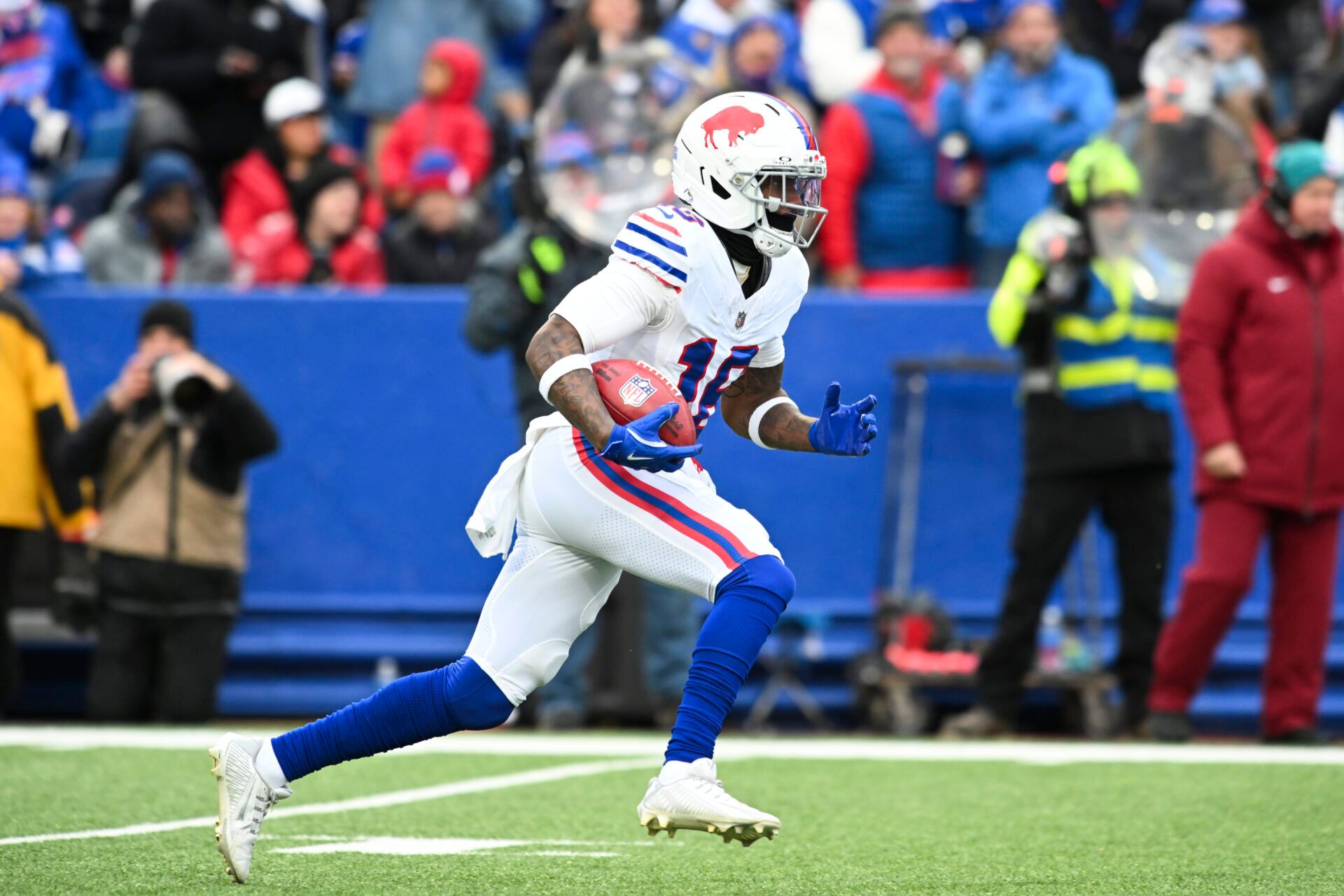 Buffalo Bills wide receiver Mecole Hardman (16) returns a kickoff against the Tampa Bay Buccaneers during the first quarter of the game at Highmark Stadium.