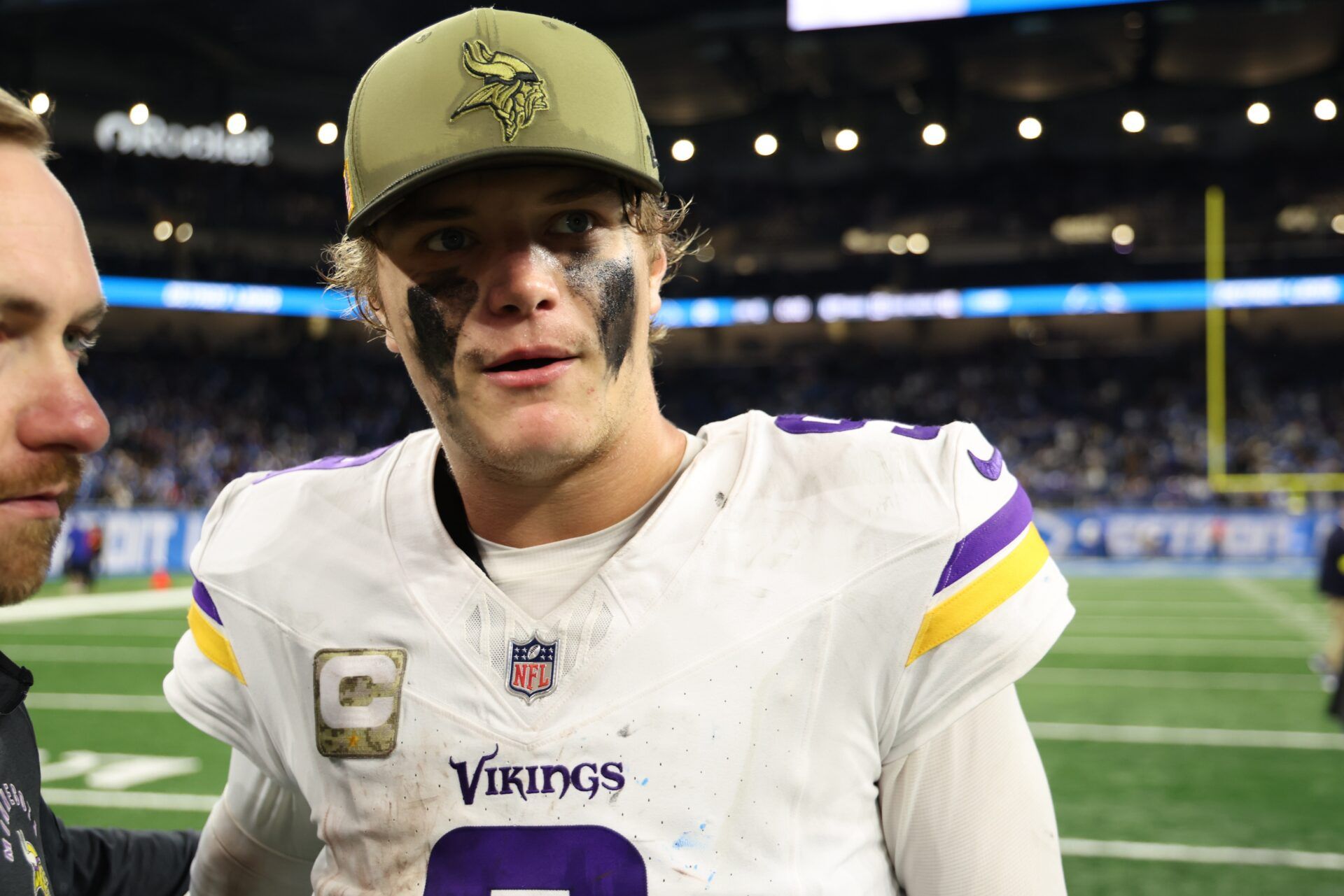 Minnesota Vikings quarterback J.J. McCarthy (9) walks off the field after the game against the Detroit Lions at Ford Field.