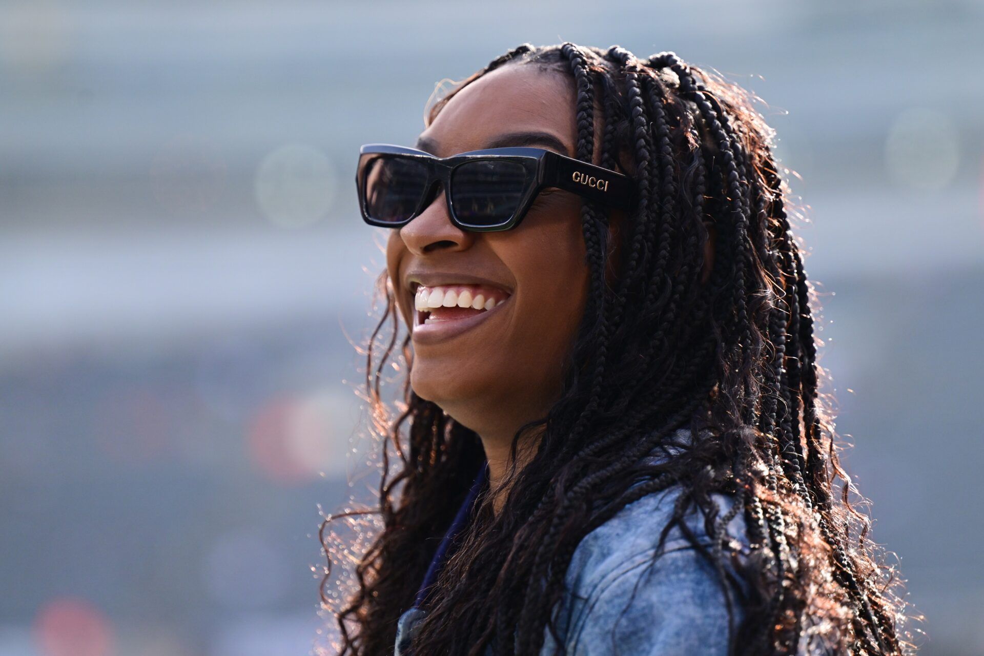 United States gymnast Simone Biles stands on the sideline before the game between the Chicago Bears and Minnesota Vikings at Soldier Field.