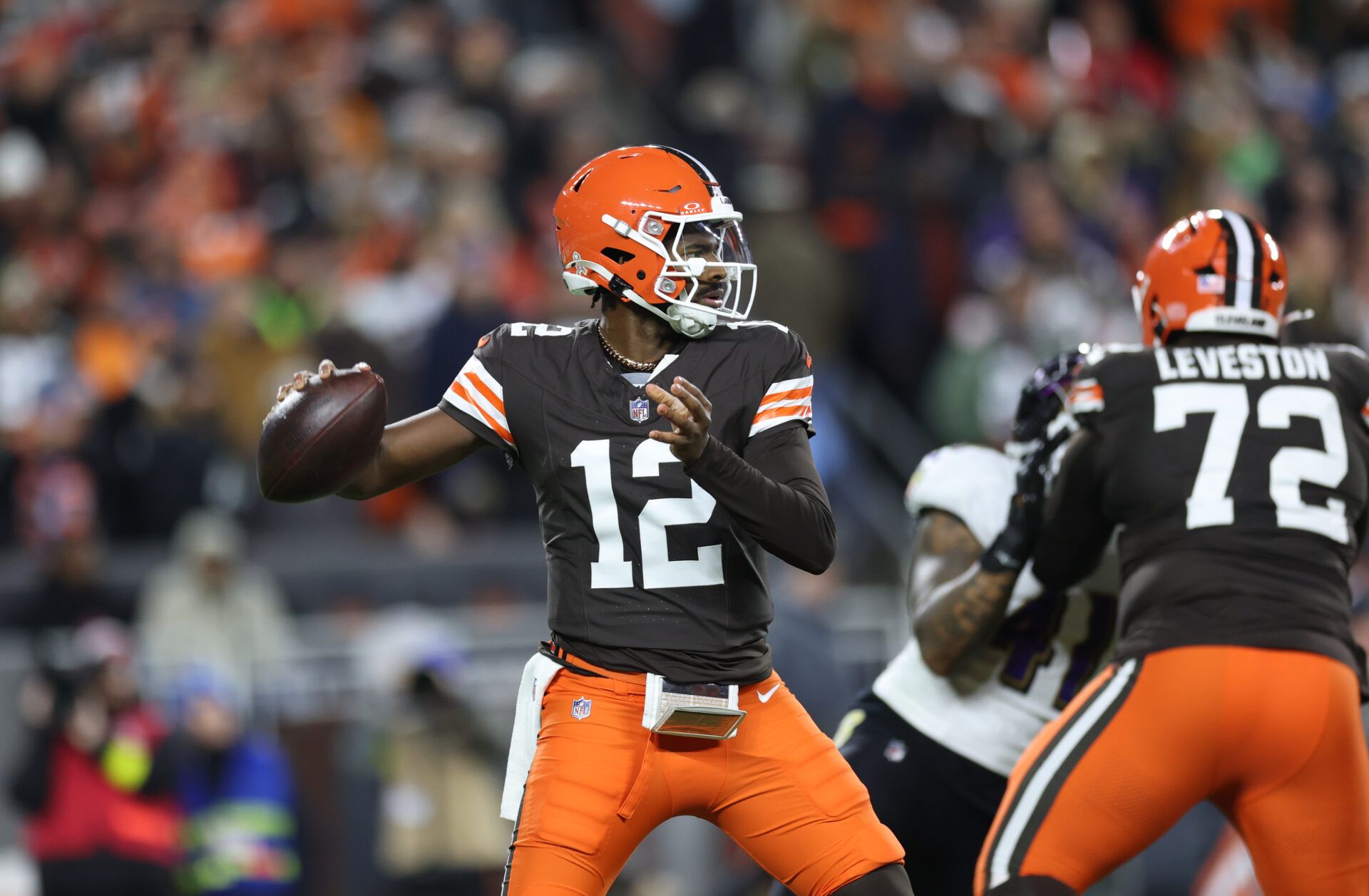 Cleveland Browns quarterback Shedeur Sanders (12) drops back to pass during the third quarter against the Baltimore Ravens at Huntington Bank Field.