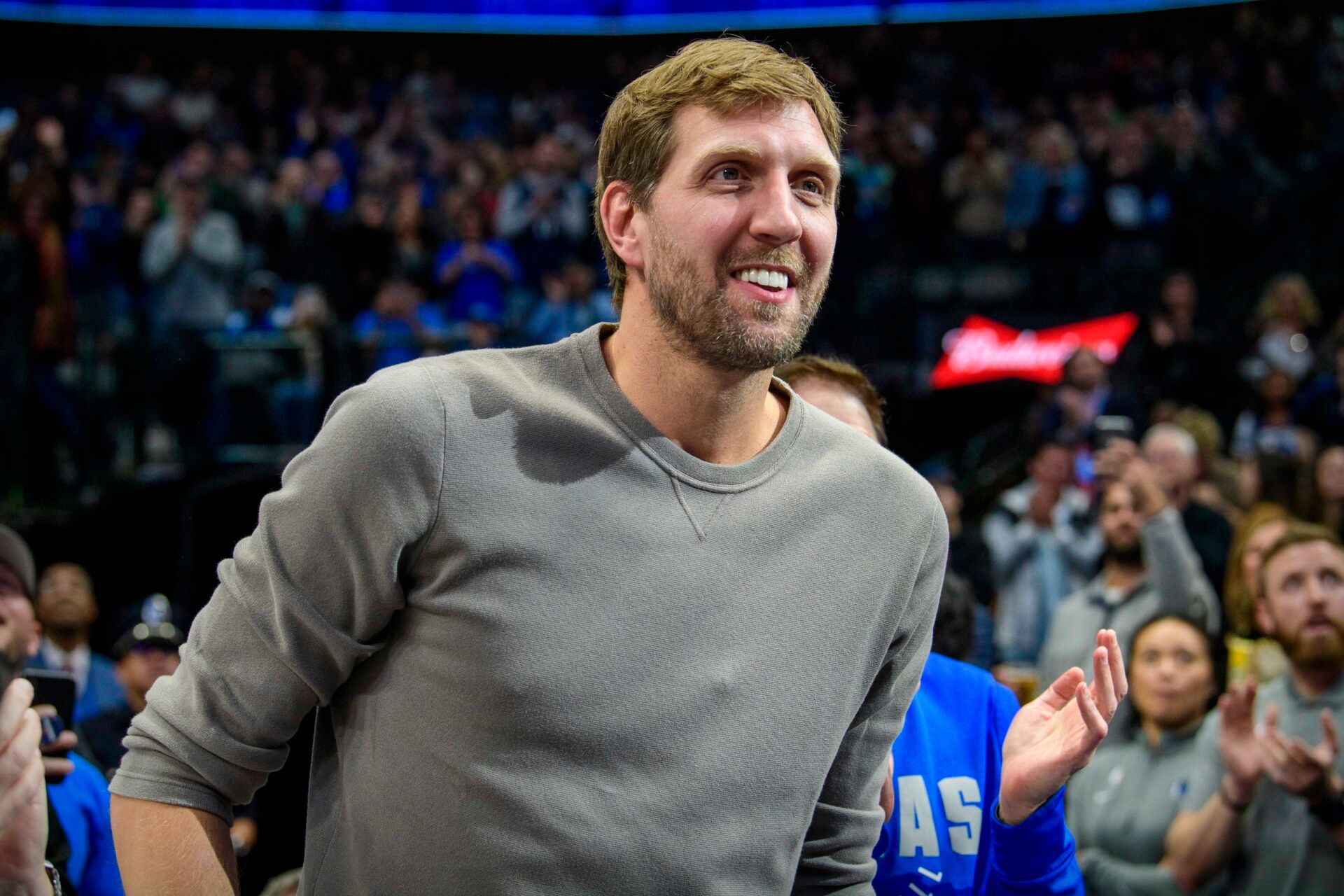 Former Dallas Mavericks player Dirk Nowitzki smiles to the crowd during the first quarter against the Cleveland Cavaliers at the American Airlines Center.