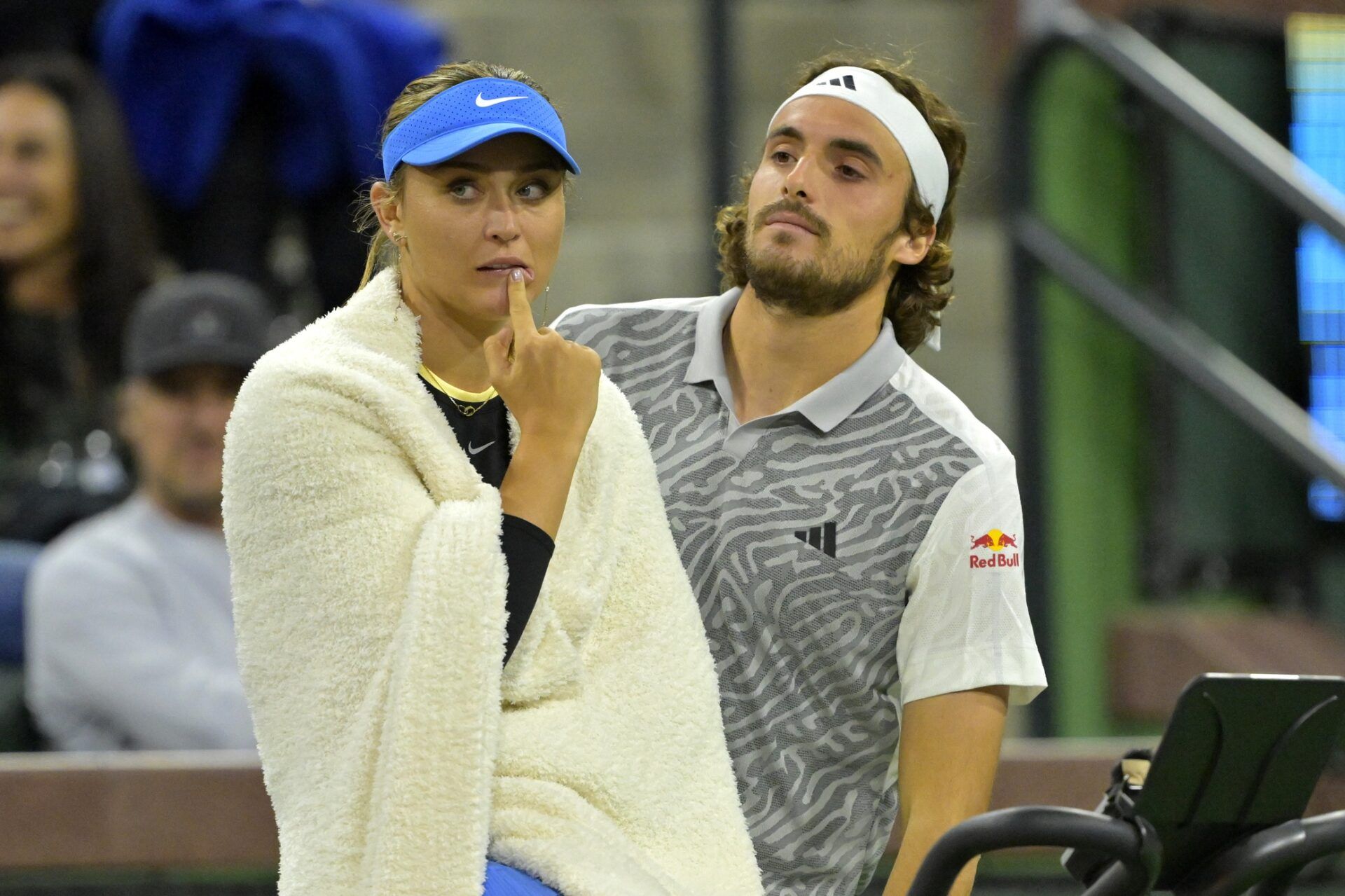 Paula Badosa and Stefanos Tsitsipas watch the action in the Eisenhower Cup Tie Break Tens event featuring mixed doubles during the BNP Paribas Open at the Indian Wells Tennis Garden.
