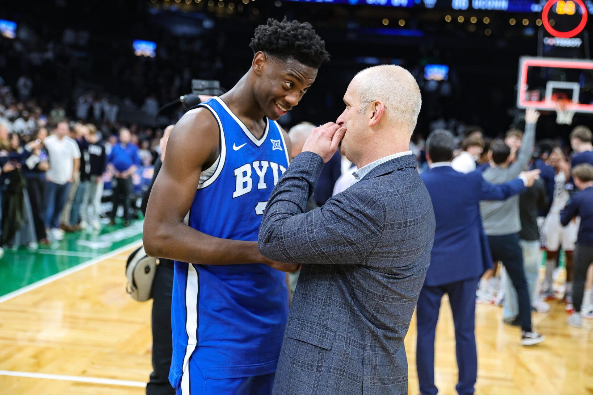 Brockton's AJ Dybantsa, of Brockton, shakes hands with UConn coach Dan Hurley during a game at TD Garden in Boston, Massachusetts on Saturday, Nov. 15, 2025.