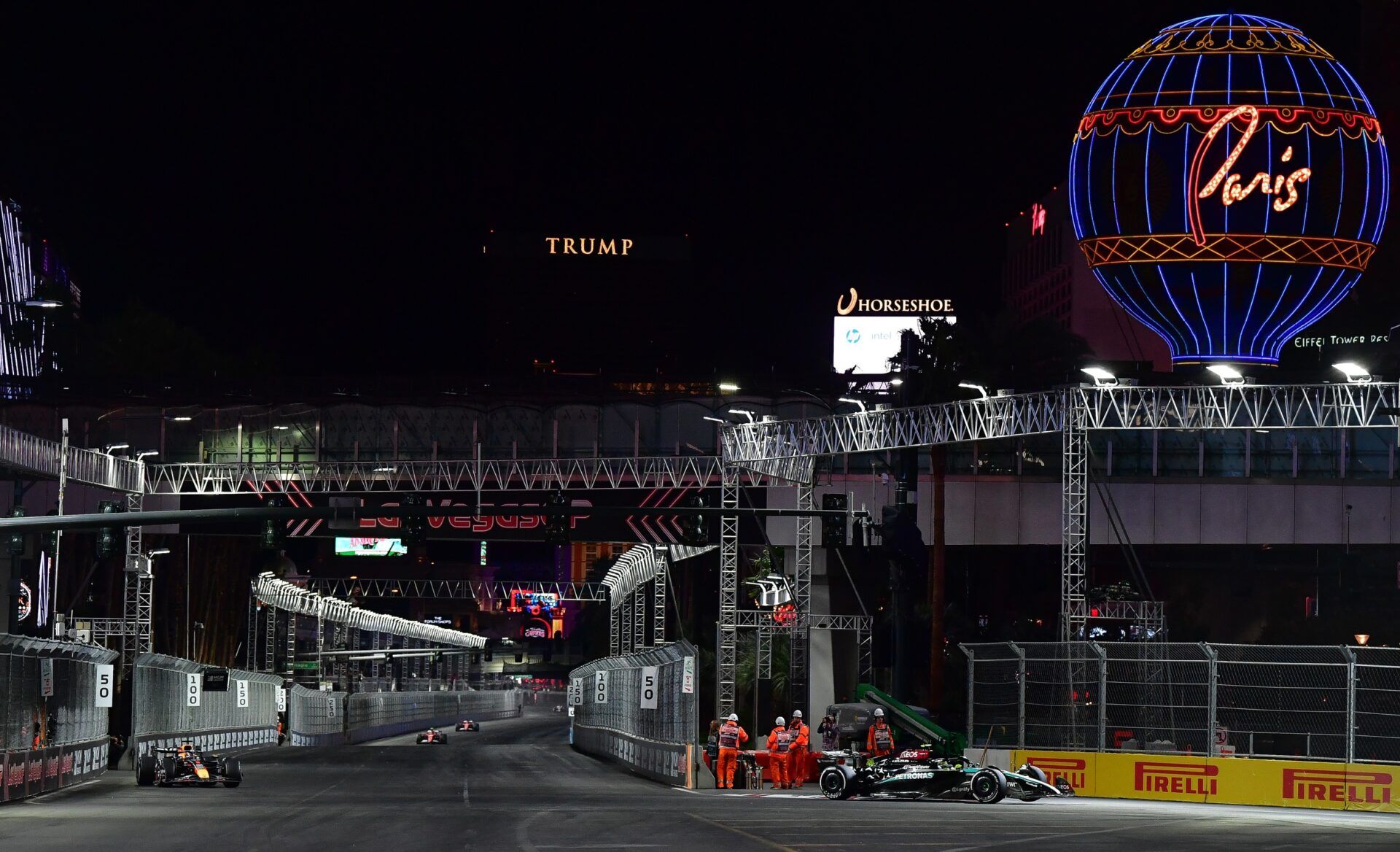 Mercedes AMG Petronas driver Lewis Hamilton (44) leads Oracle Red Bull Racing driver Max Verstappen (1)  during the Las Vegas Grand Prix at Las Vegas Circuit.