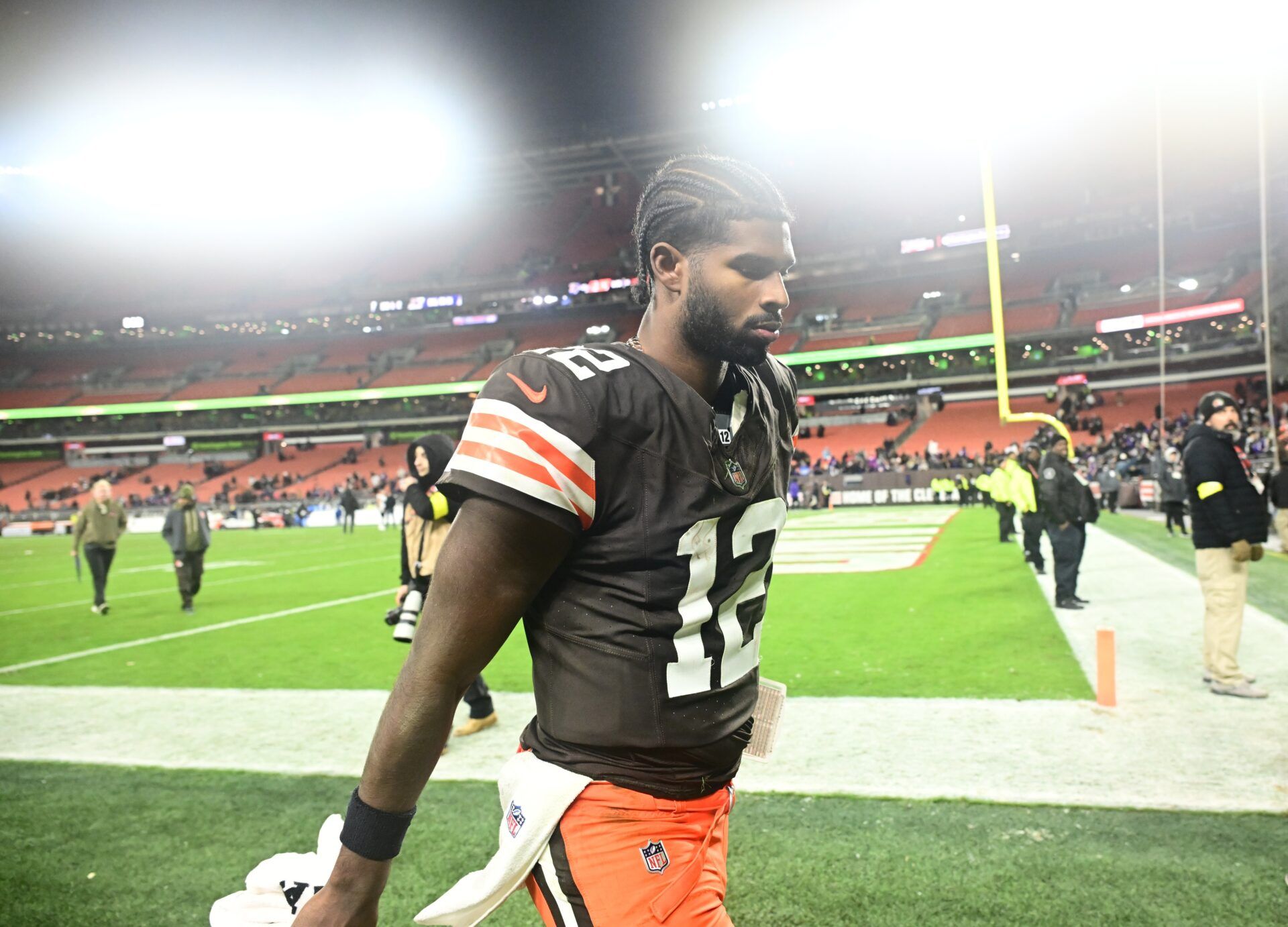 Cleveland Browns quarterback Shedeur Sanders (12) walks off the field following a game against the Baltimore Ravens at Huntington Bank Field.
