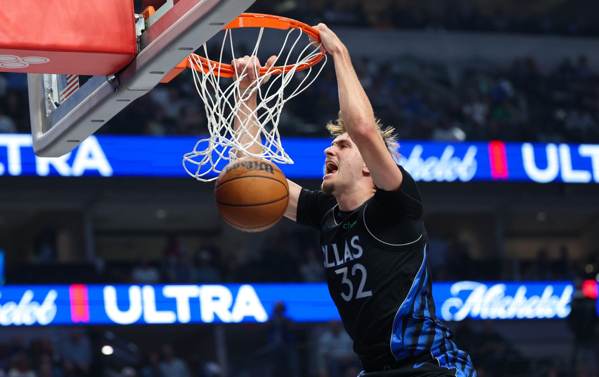 Dallas Mavericks forward Cooper Flagg (32) dunks during the first quarter against the Portland Trail Blazers at American Airlines Center.
