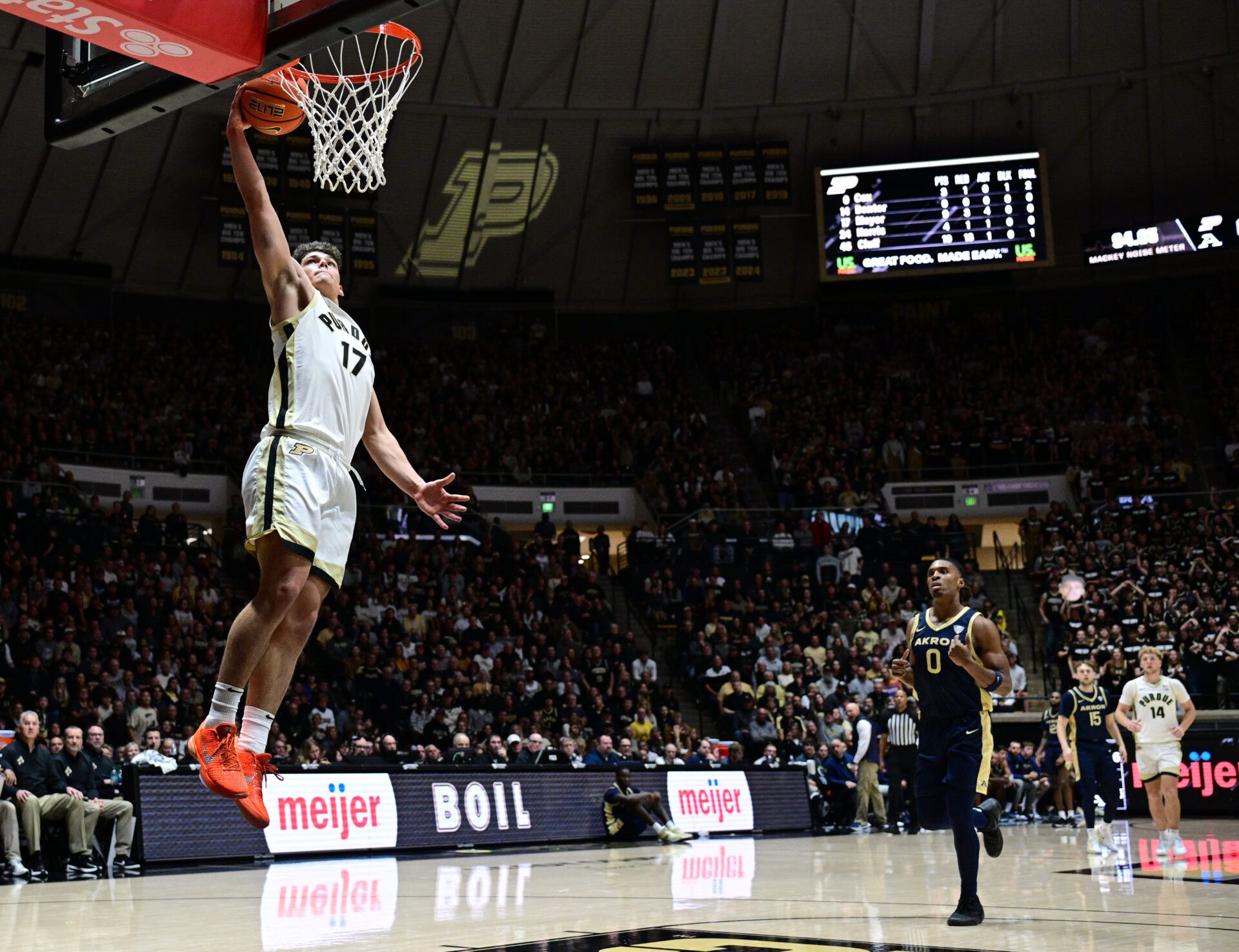 Purdue Boilermakers guard Omer Mayer (17) dunks the ball far in front of Akron Zips forward Amani Lyles (0) during the second half at Mackey Arena.