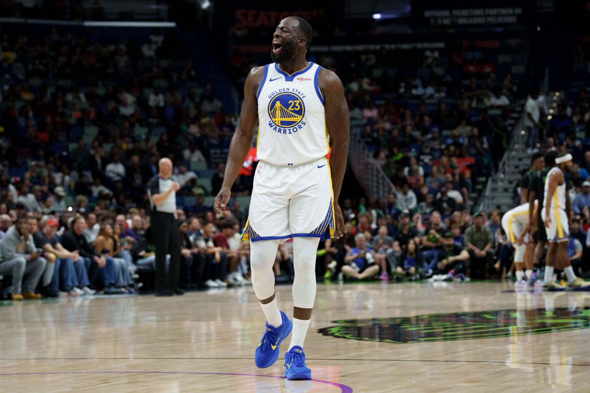 Golden State Warriors forward Draymond Green (23) shouts “Angel Reese” after missing several shots in a row and rebounding them himself during the first half against the New Orleans Pelicans at Smoothie King Center.