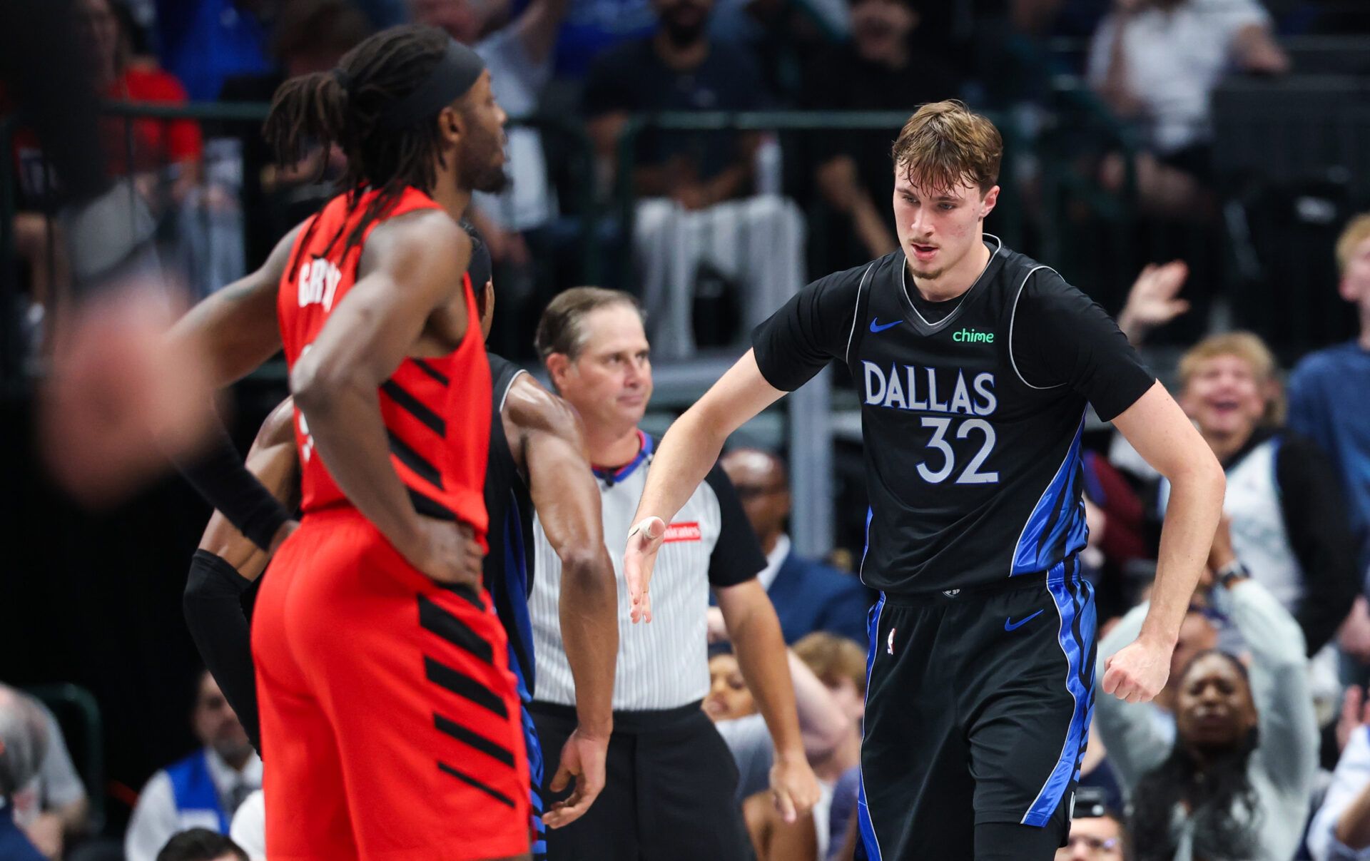 Dallas Mavericks forward Cooper Flagg (32) reacts after scoring against the Portland Trail Blazers during the second half at American Airlines Center.