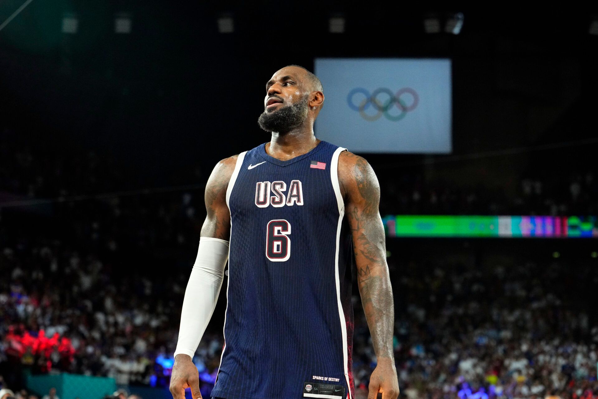 United States guard LeBron James (6) celebrates after defeating France in the men's basketball gold medal game during the Paris 2024 Olympic Summer Games at Accor Arena.