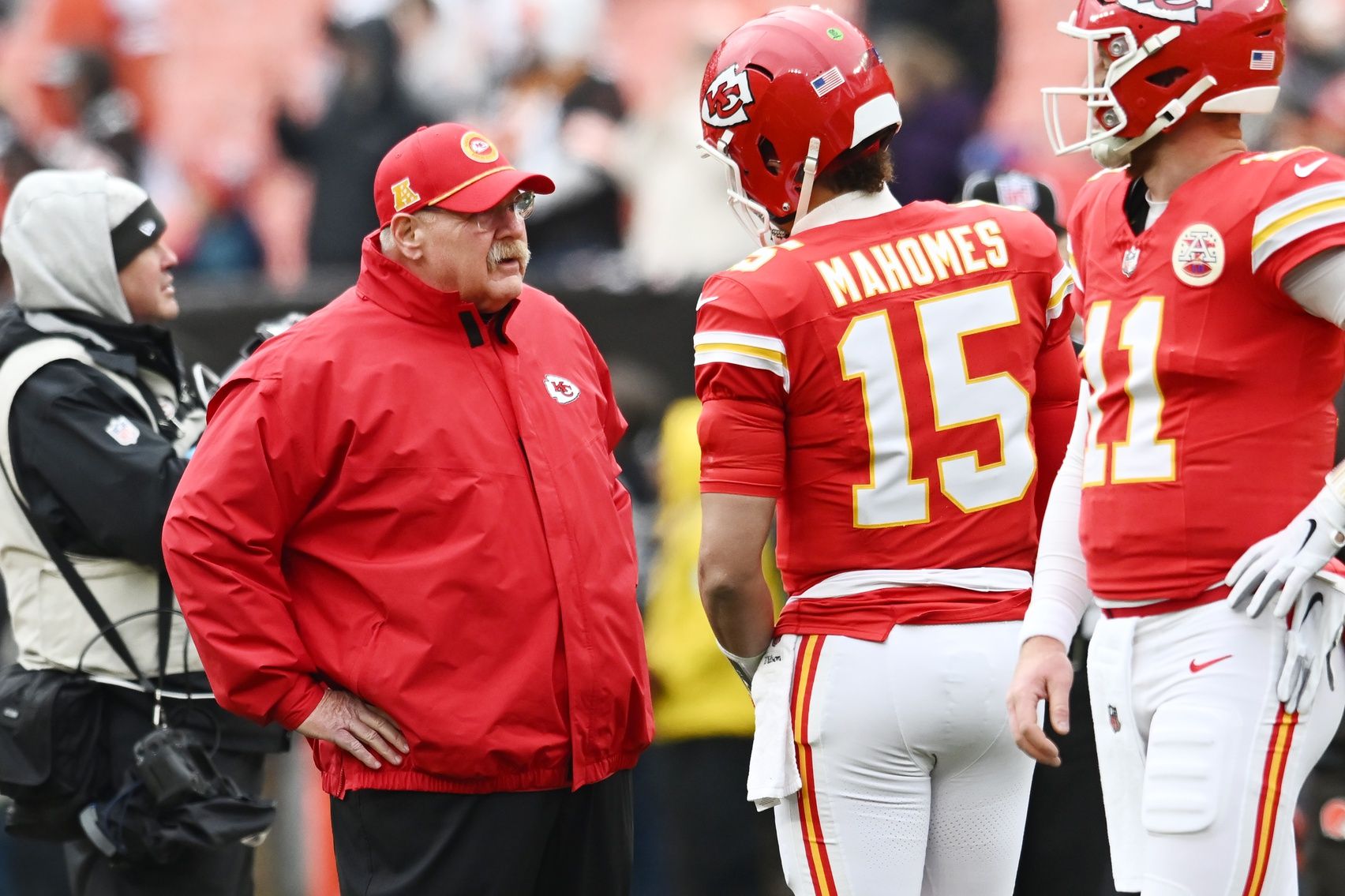 Kansas City Chiefs head coach Andy Reid talks to quarterback Patrick Mahomes (15) before the game between the Cleveland Browns and the Chiefs at Huntington Bank Field.