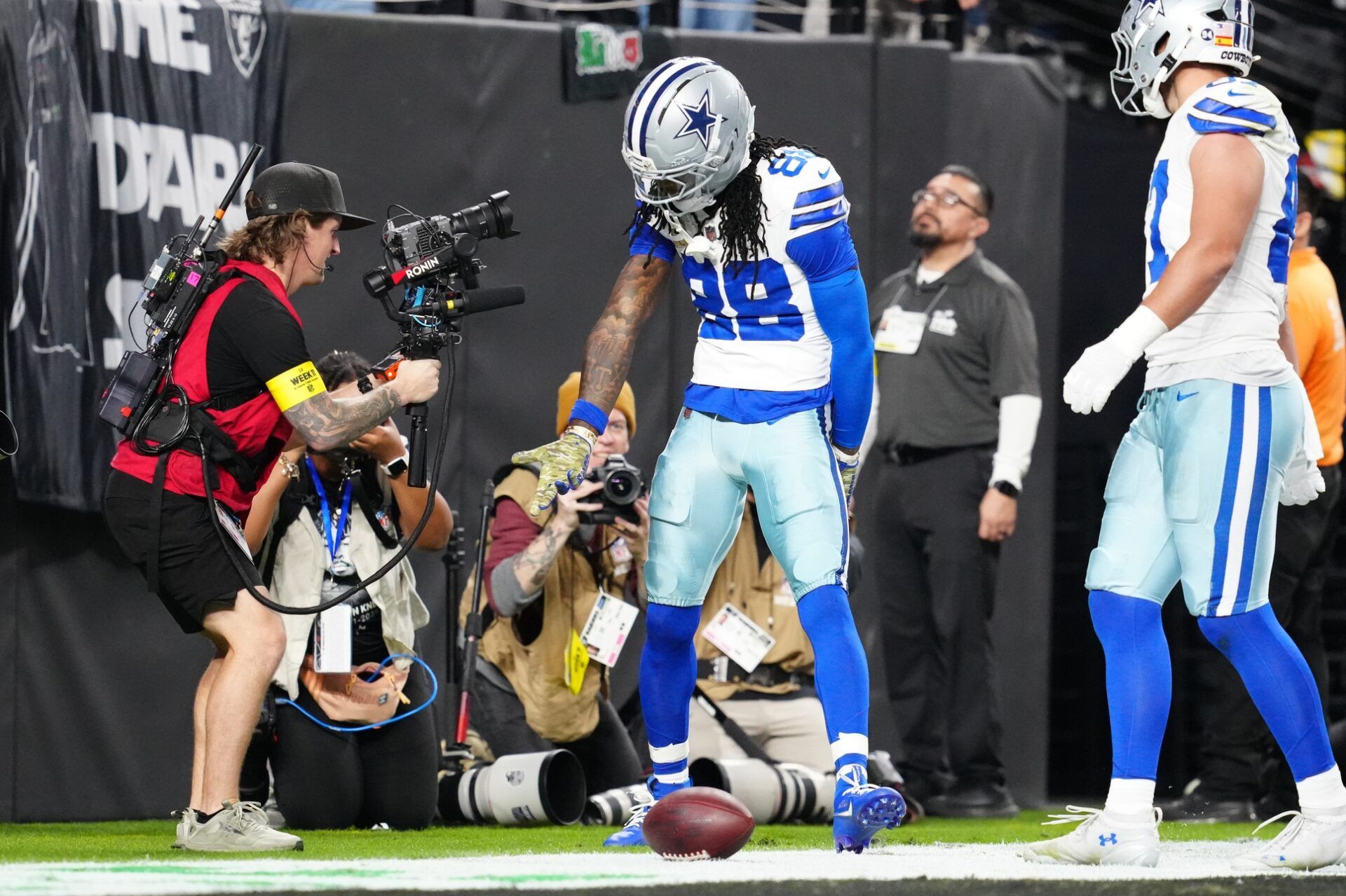 Dallas Cowboys wide receiver CeeDee Lamb (88) reacts after catching a touchdown against the Las Vegas Raiders at Allegiant Stadium.