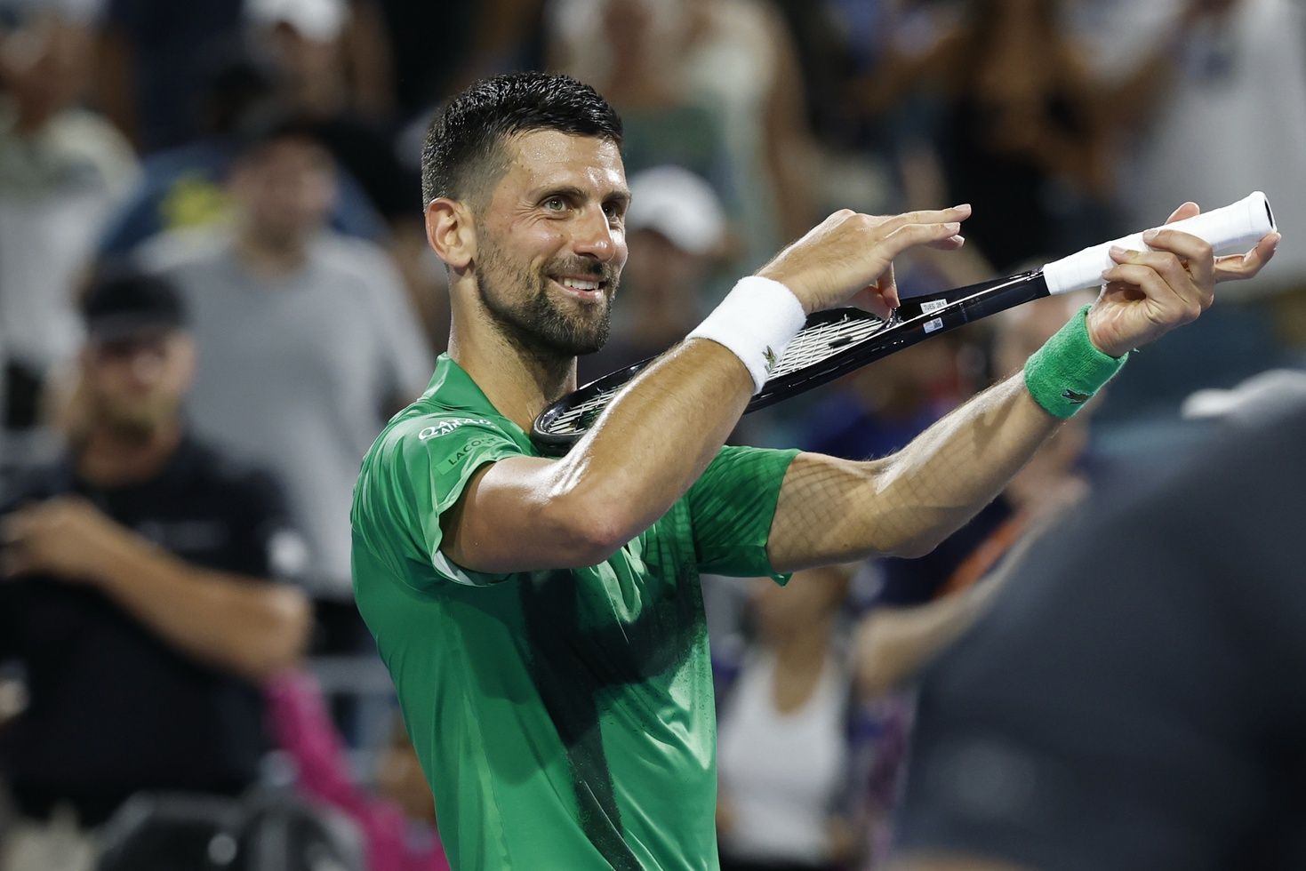 Novak Djokovic (SRB) celebrates after his match against Lorenzo Musetti (ITA)(not pictured) on day eight of the Miami Open at Hard Rock Stadium.