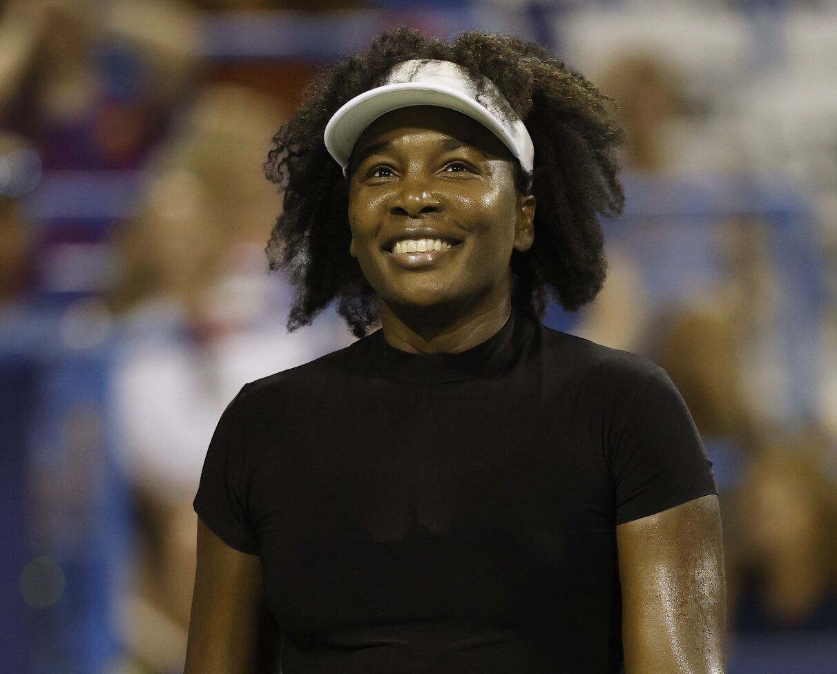 Venus Williams (USA) smiles after losing a match point against Peyton Stearns (USA)(not pictured) in a women's singles match on day two of the Mubadala Citi DC Open at Rock Creek Park Tennis Center.