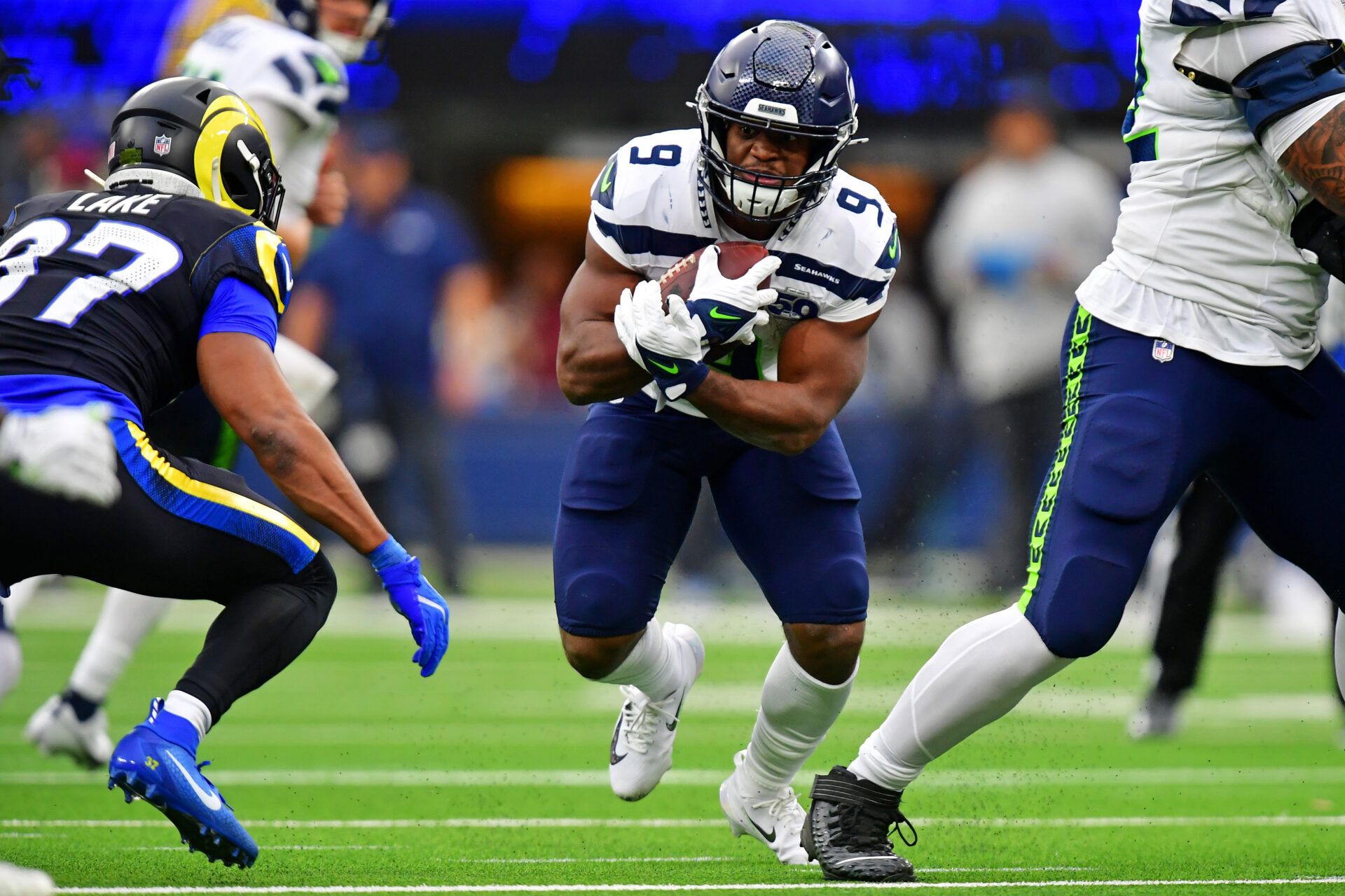 Seattle Seahawks running back Kenneth Walker III (9) runs the ball during the first half against the Los Angeles Rams at SoFi Stadium.
