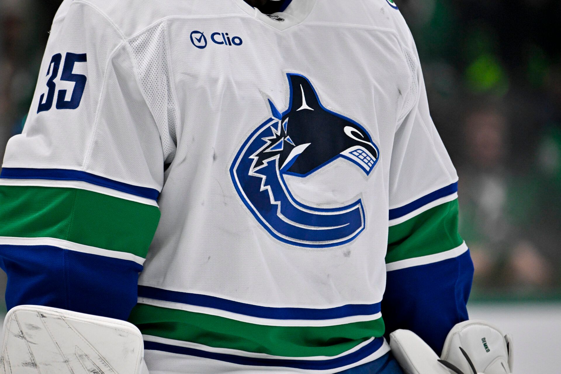 A view of the team logo on the jersey of Vancouver Canucks goaltender Thatcher Demko (35) during the game between the Dallas Stars and the Vancouver Canucks at the American Airlines Center.
