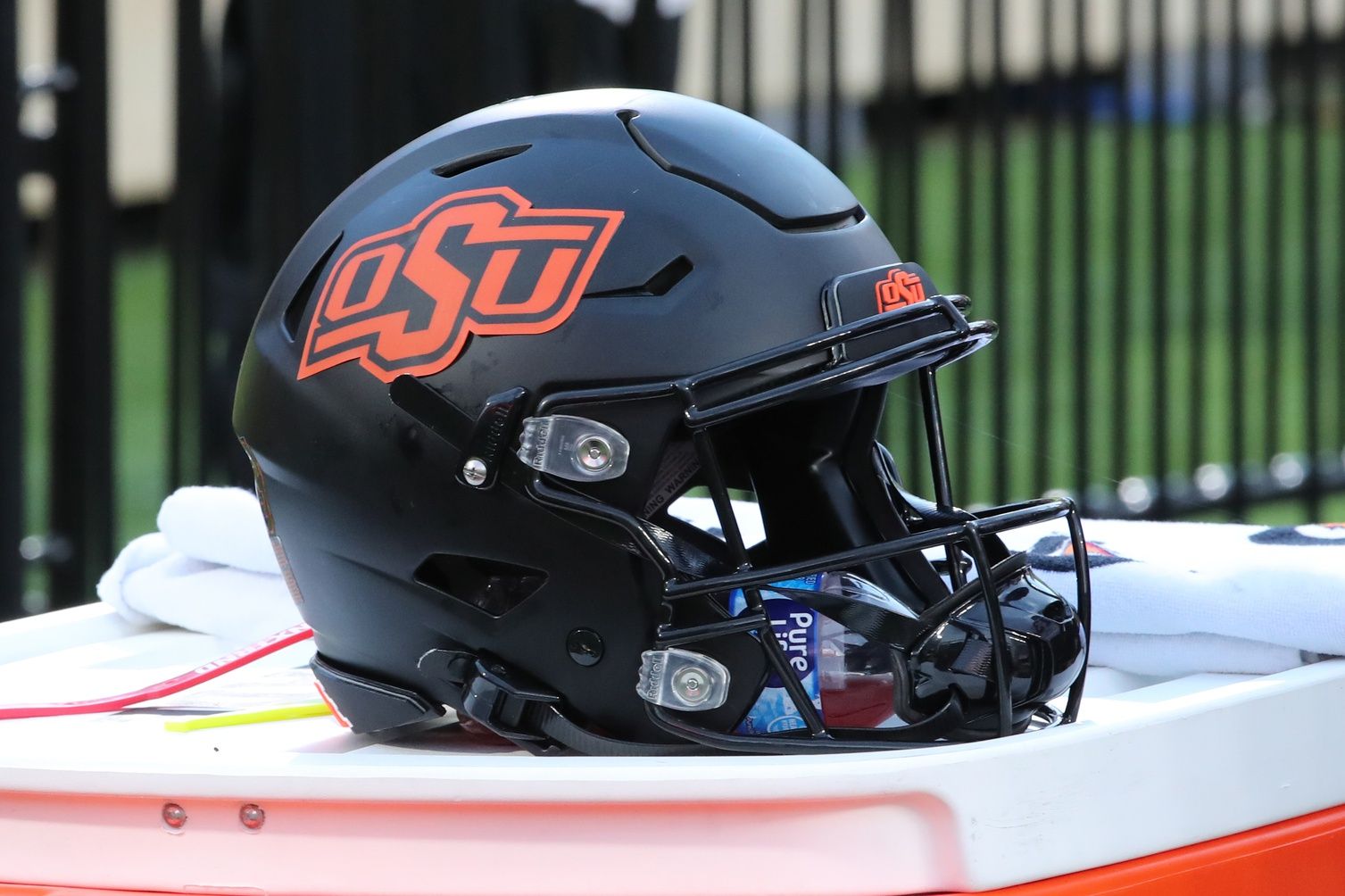 A general view of an Oklahoma State Cowboys helmet on the bench in the second half of the game against the Texas Tech Red Raiders at Jones AT&T Stadium.