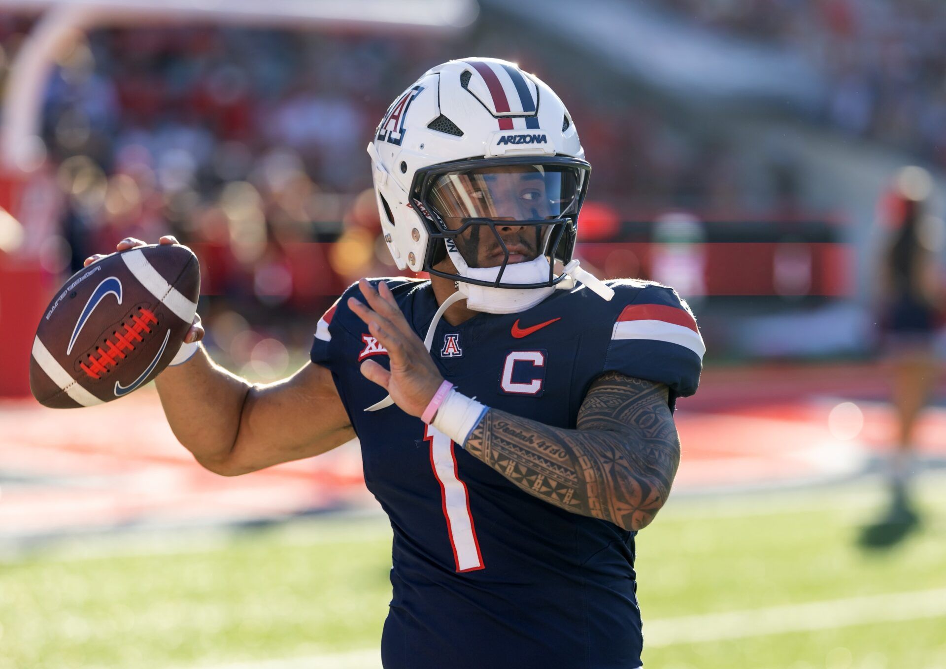 Arizona Wildcats quarterback Noah Fifita (1) against the Kansas Jayhawks at Arizona Stadium.