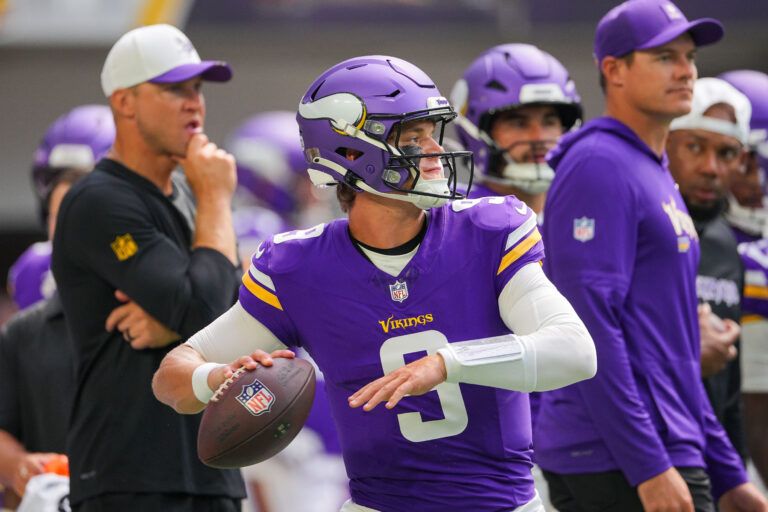 Minnesota Vikings quarterback J.J. McCarthy (9) warms up before the game against the Houston Texans at U.S. Bank Stadium.