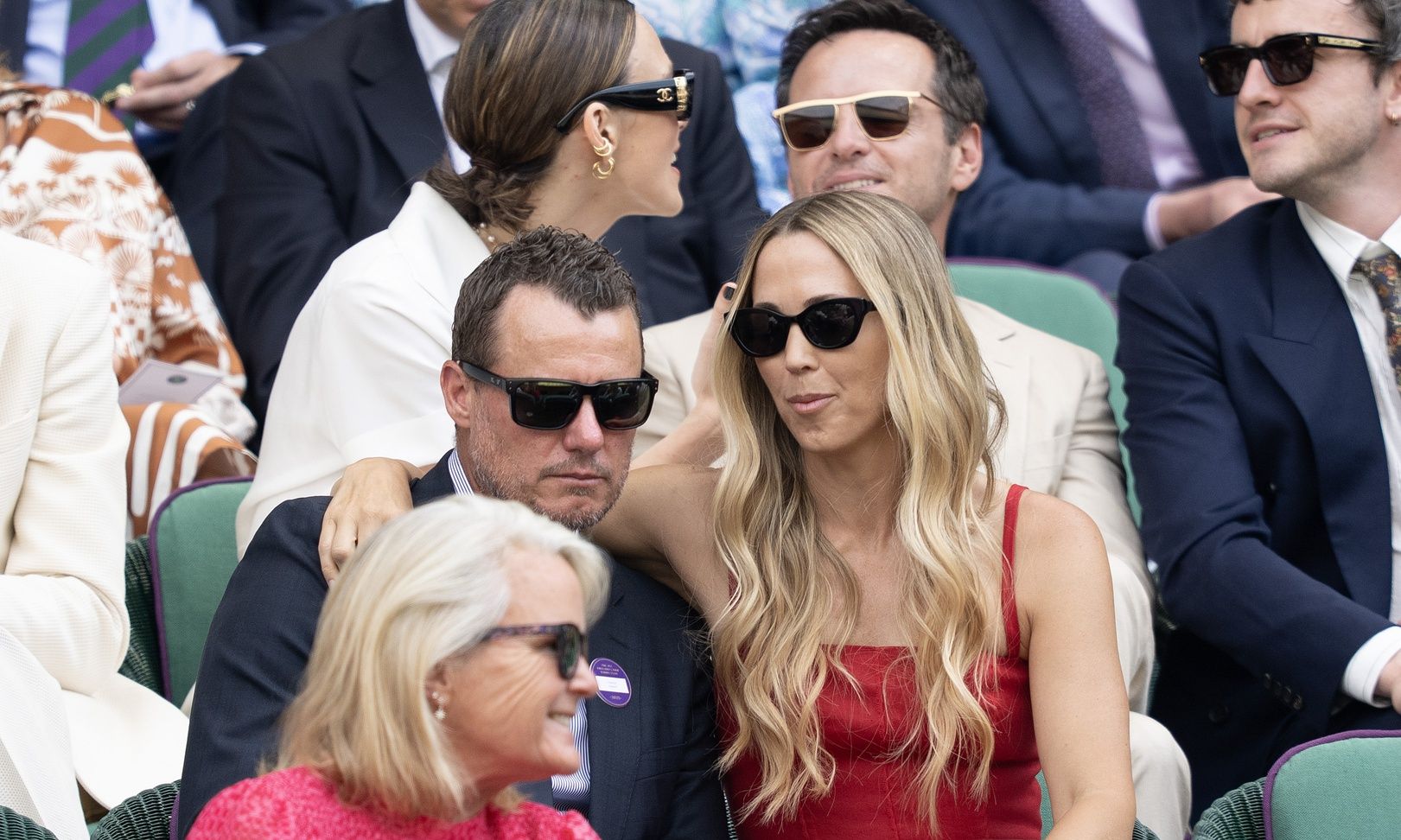 Lleyton Hewitt and his wife, Rebecca Hewitt in the Royal Box on day 14 at All England Lawn Tennis and Croquet Club.