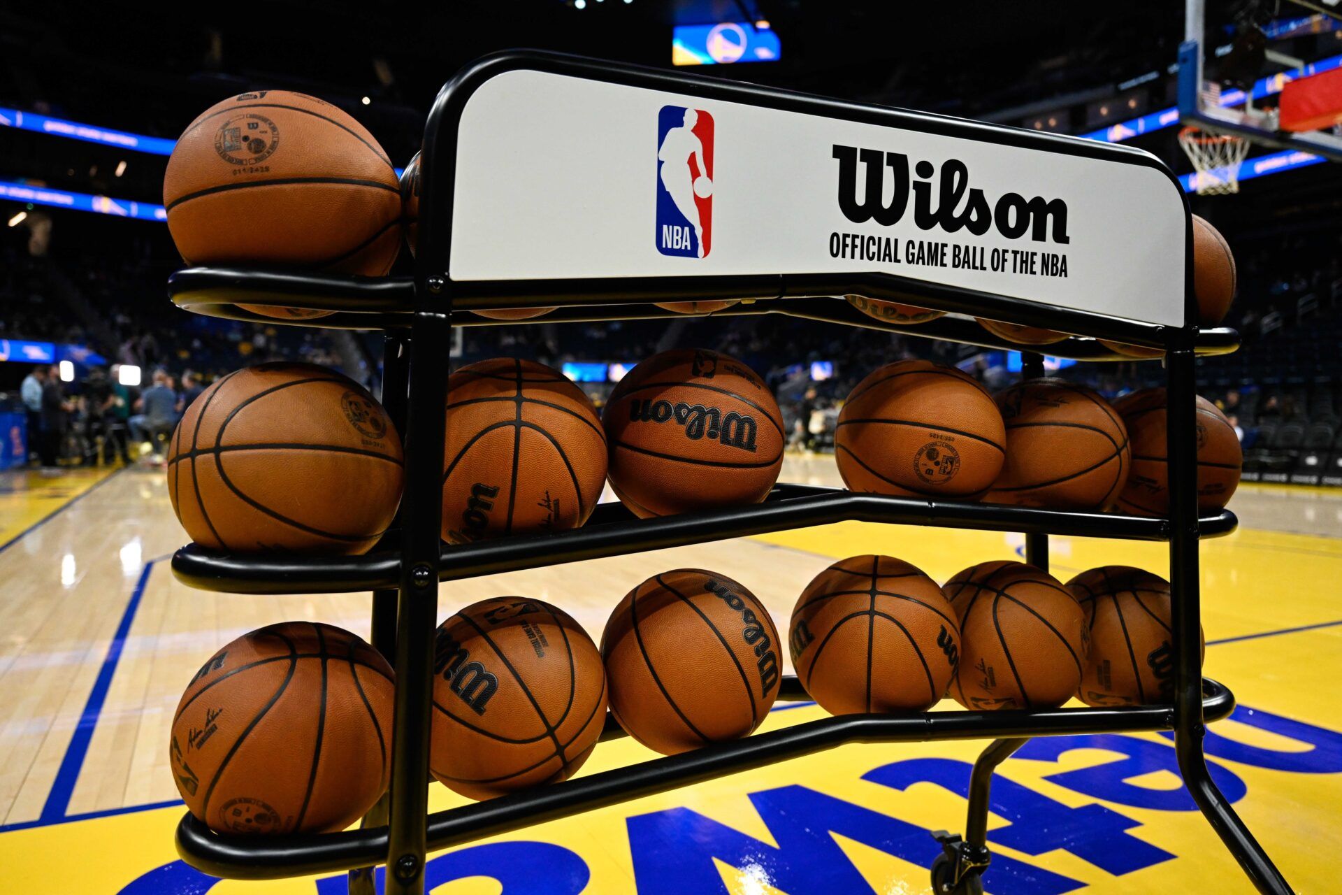 The NBA and Wilson logos are seen on a basketball cart during warm ups before the Golden State Warriors play the Indiana Pacers at Chase Center.